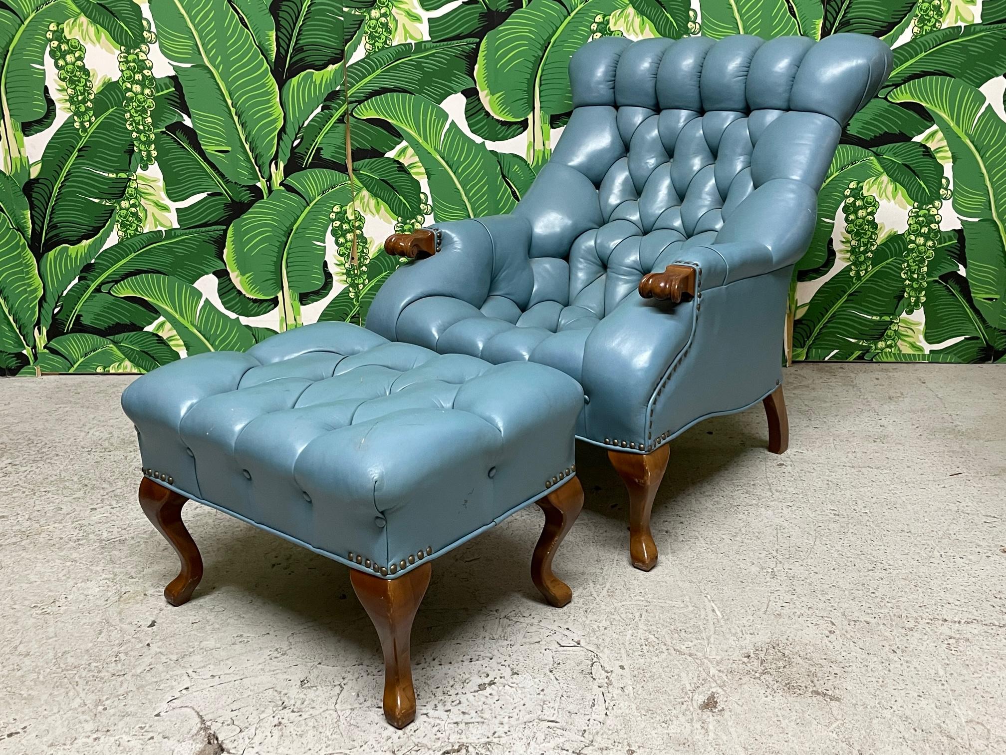 Vintage Chesterfield style chair and ottoman in blue leather upholstery. Good vintage condition with minor flaws (see photos).
 
 