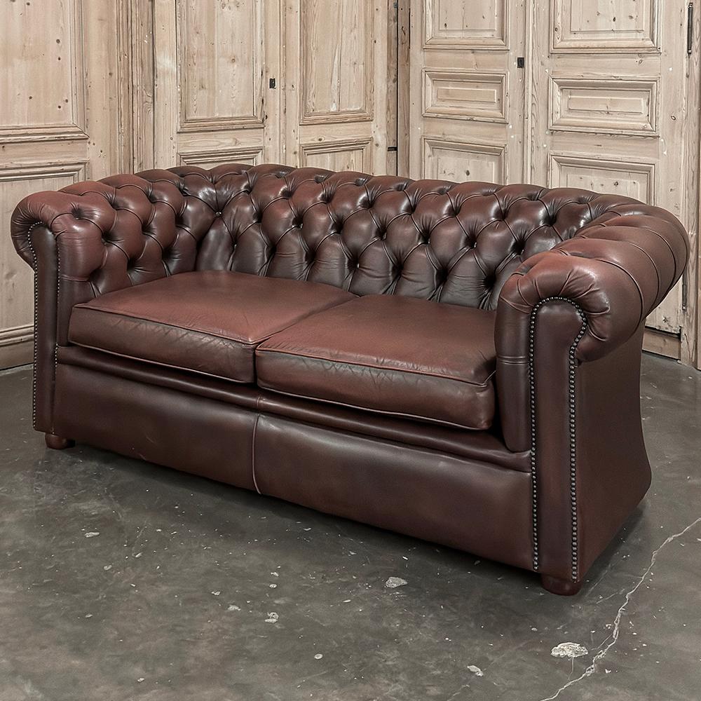 Vintage Tufted Leather Chesterfield Sofa is a design that has defined the essence of comfort for over 75 years and remains popular even today thanks to its classic lines!  Tufted leather helps the back to 