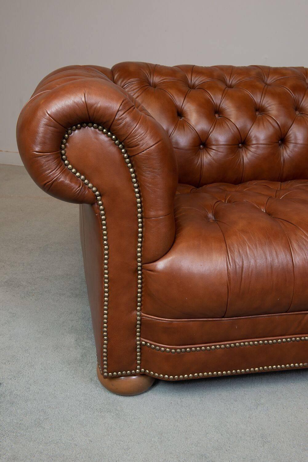 vintage tufted leather sofa