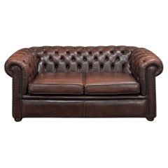 Sofa Chesterfield vintage en cuir touffeté