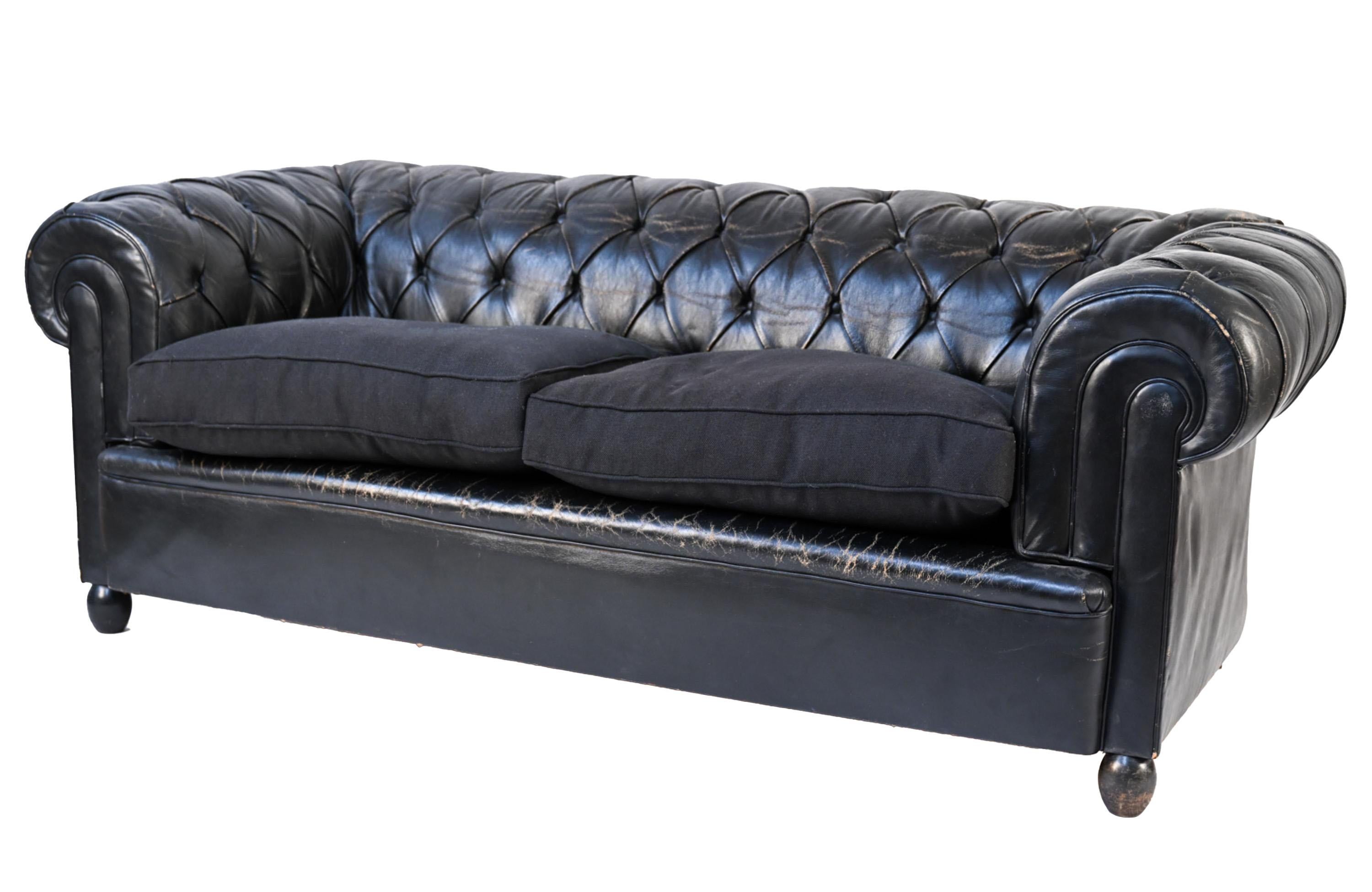 American Vintage Tufted Leather Chesterfield Sofas, a Pair