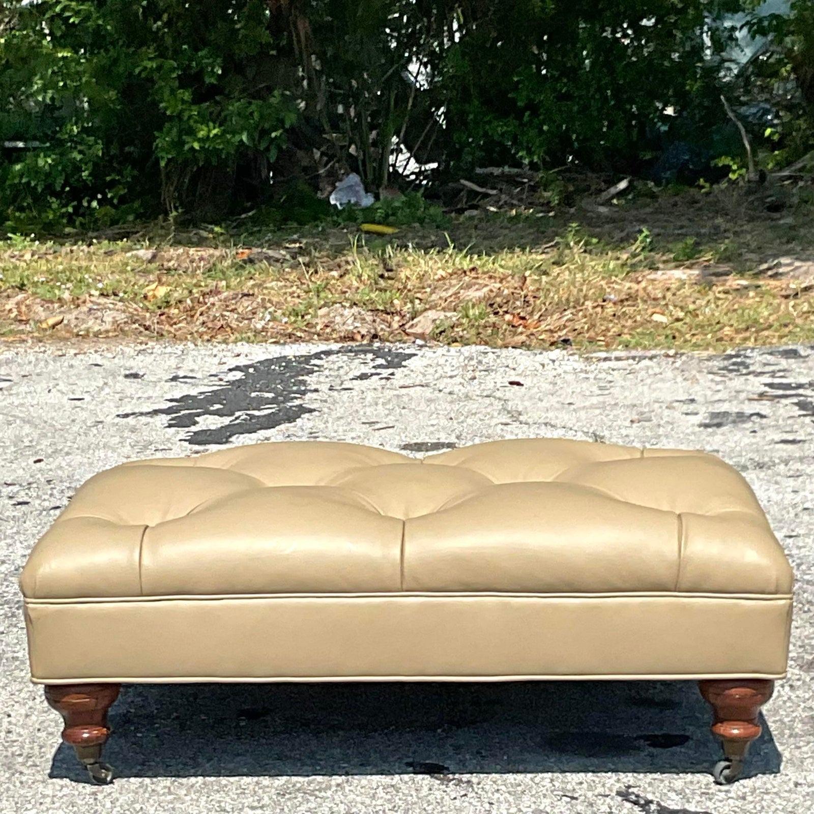 A fantastic vintage tufted leather ottoman, use it as a coffee table and put your feet on it. Acquired at a Palm Beach estate.