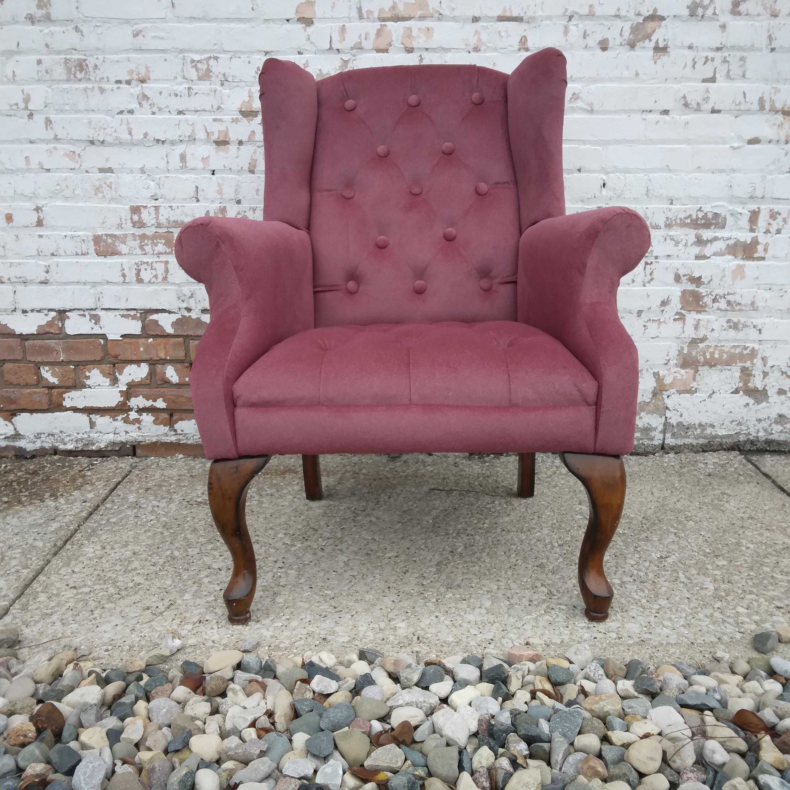 Adorable and lush, this vintage wingback chair is the perfect way to add color and style to your space! We love her plump tufting and small stature. The berry-hued chenille is incredibly soft and very durable.  Falling somewhere between dusty rose