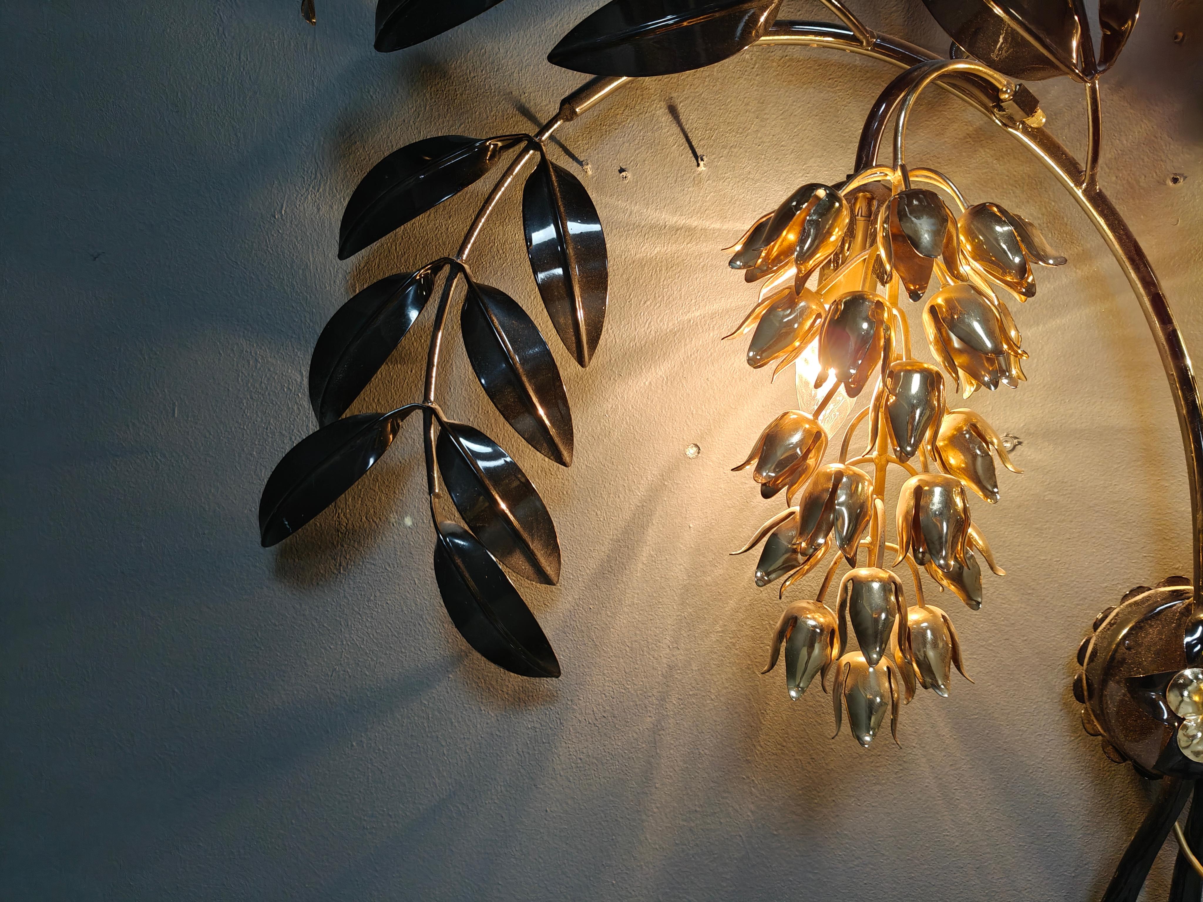 
Aplique vintage de metal negro y oro de Hans Kögl con hojas y tulipanes.

El aplique tiene 2 puntos de luz.

Probado y listo para usar.

años 70 - Italia

Dimensión:
Altura: 60 cm
Anchura: 105 cm
profundidad: 15 cm

Ref: 2509250101

*Todas las