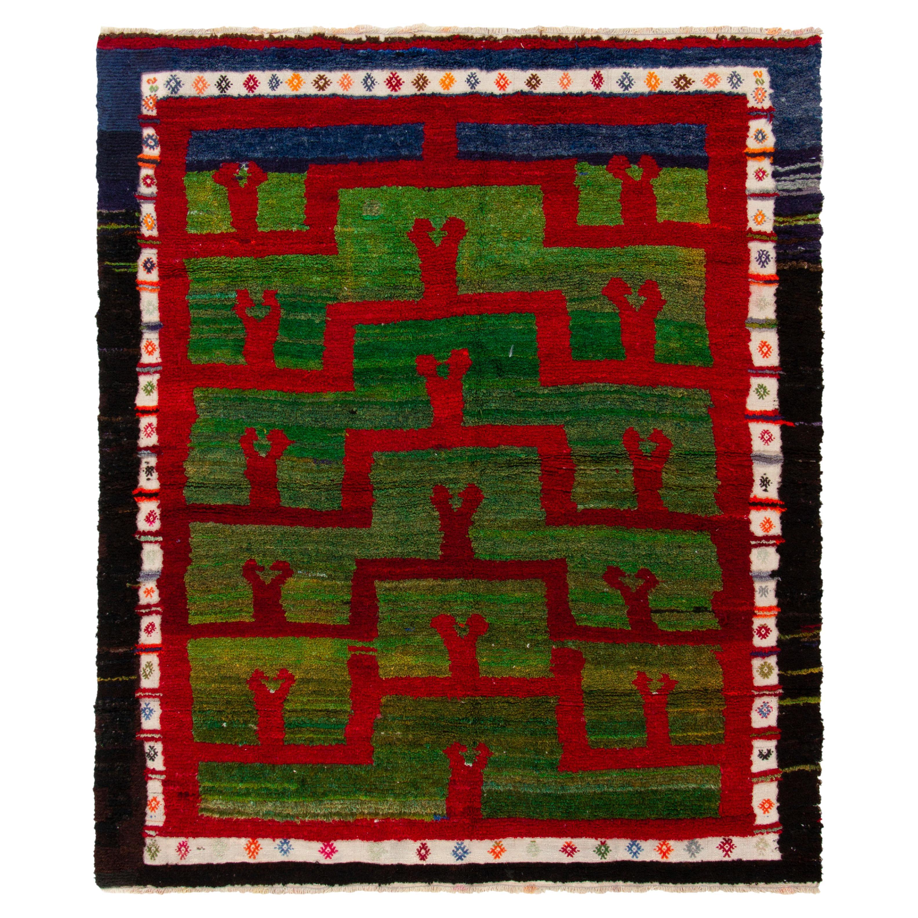 Vintage Tulu Teppich, blaue Bordüre mit grünem und rotem geometrischem Muster von Teppich & Kelim