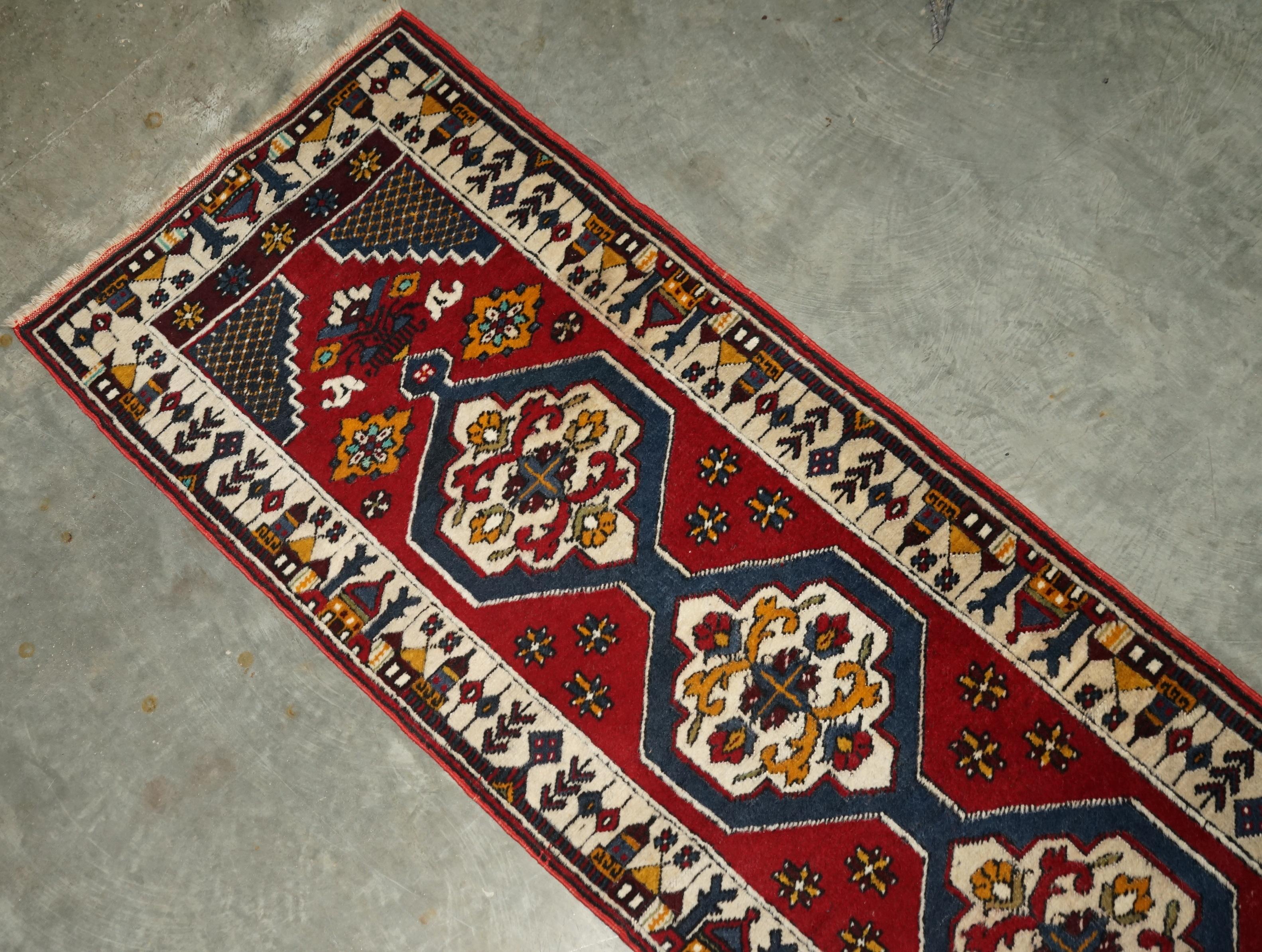 We are delighted to offer for sale this large country house, vintage Turkish wool runner rug with lovely Aztek Kilim style design circa dated 1977

This one looks to be in pretty much perfect condition throughout 

Dimensions

Width:-
