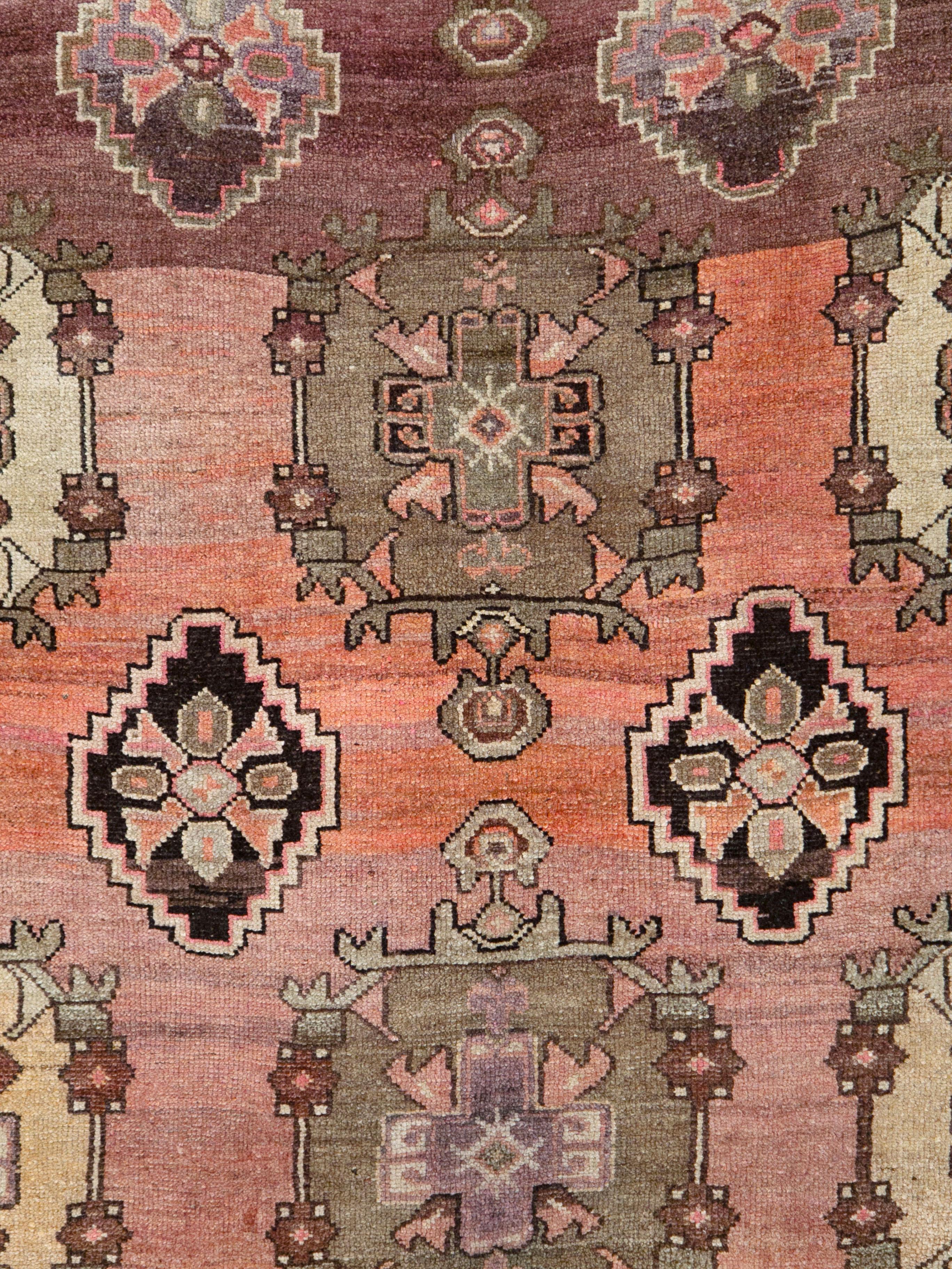 A vintage Turkish Anatolian rug from the mid-20th century in gallery format.