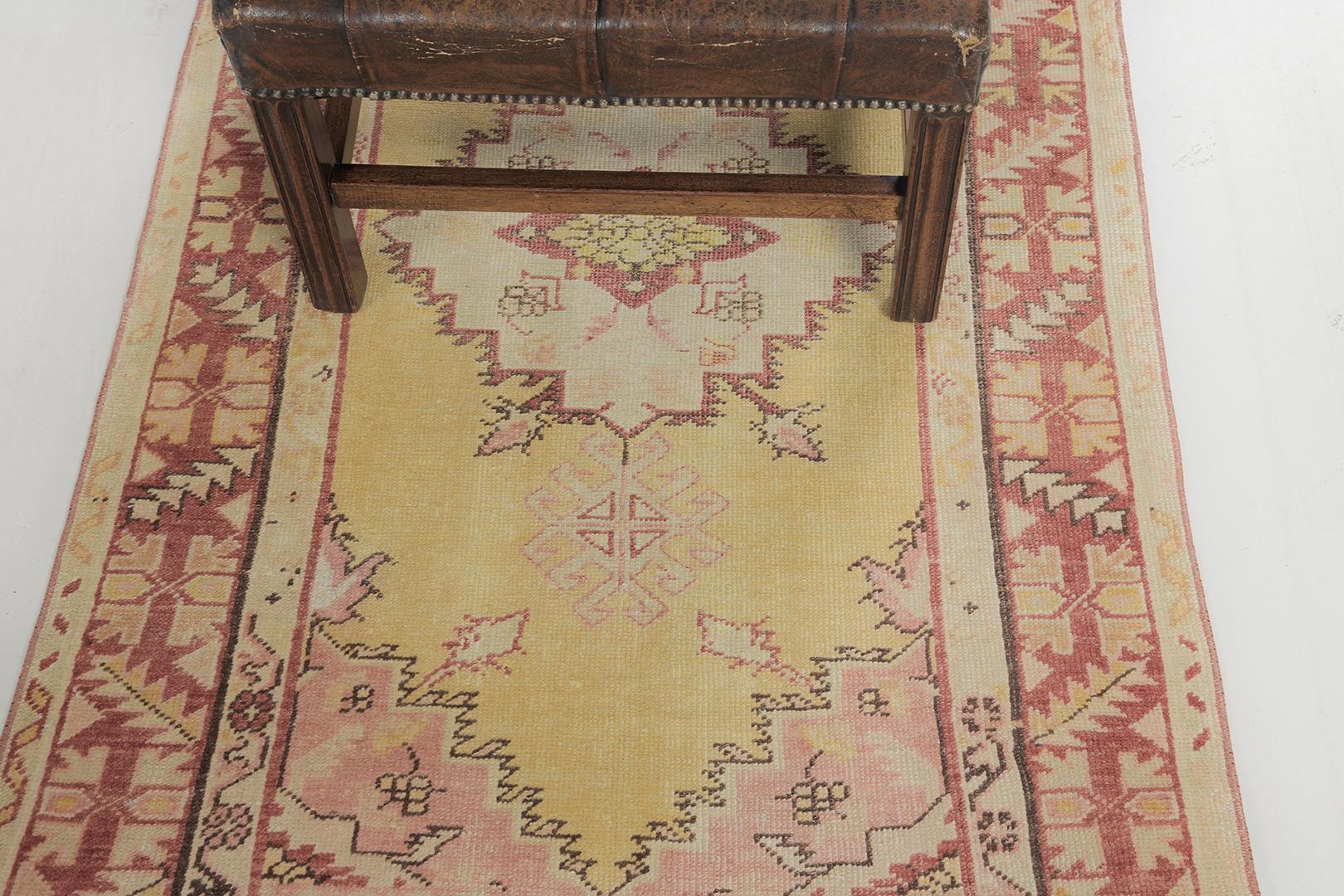 This elegant and timeless Turkish Anatolian rug made from vegetable dye has an intricate and clear symmetric design. Guney has a blooming red color palette and golden yellow at its core perfectly matches the neutral motifs reflected. If you want a