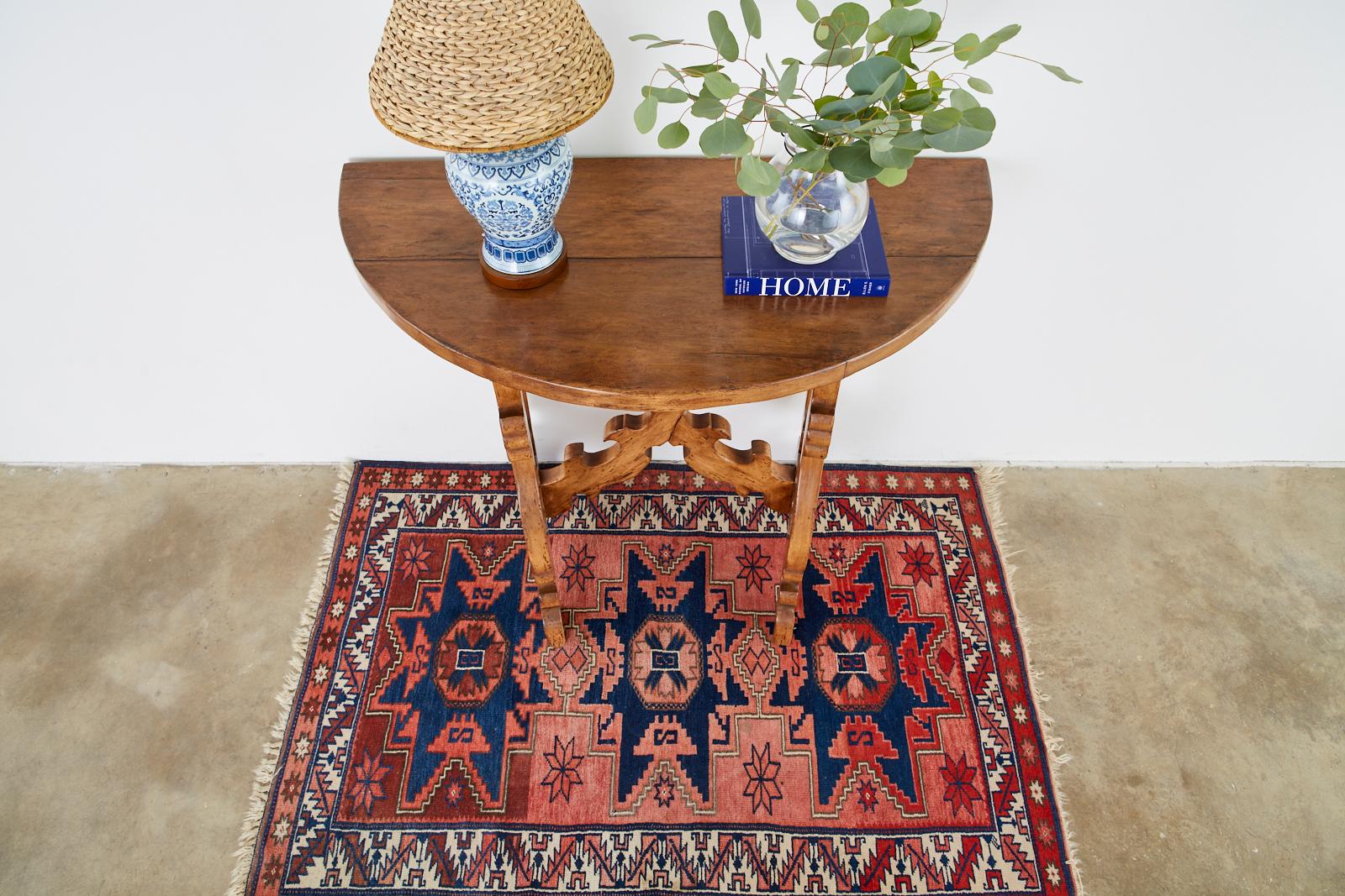 Kazak style vintage Turkish Anatolian konya rug featuring traditional geometric designs and stars. Beautifully crafted with fading and abrash.