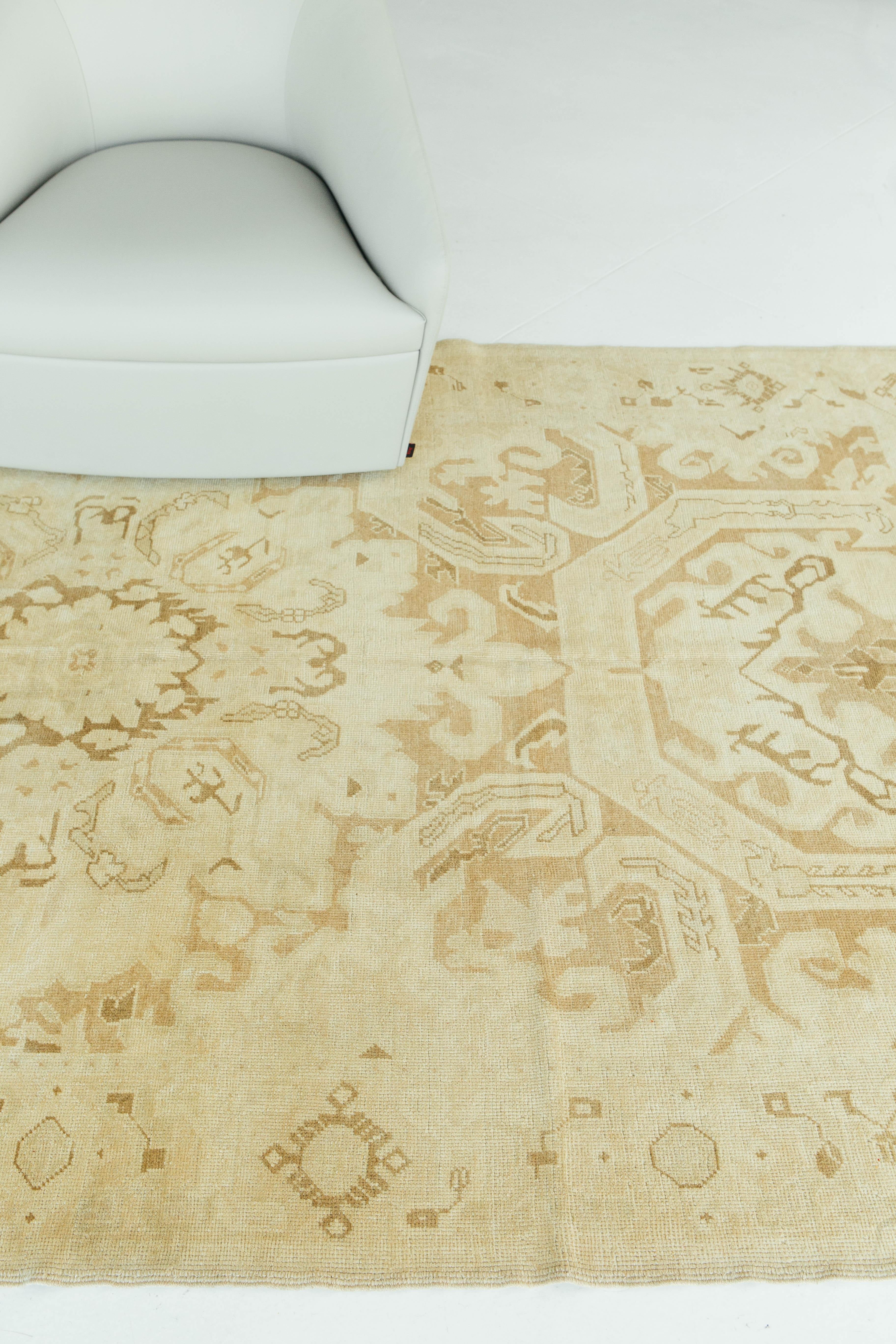 Vintage Turkish Anatolian rugs weave together dyes and colors, motifs, textures and techniques that are popular in Anatolia or Asia minor. This piece is composed with beautiful tribal work tying together symmetrical knots in ivory hues of taupe.