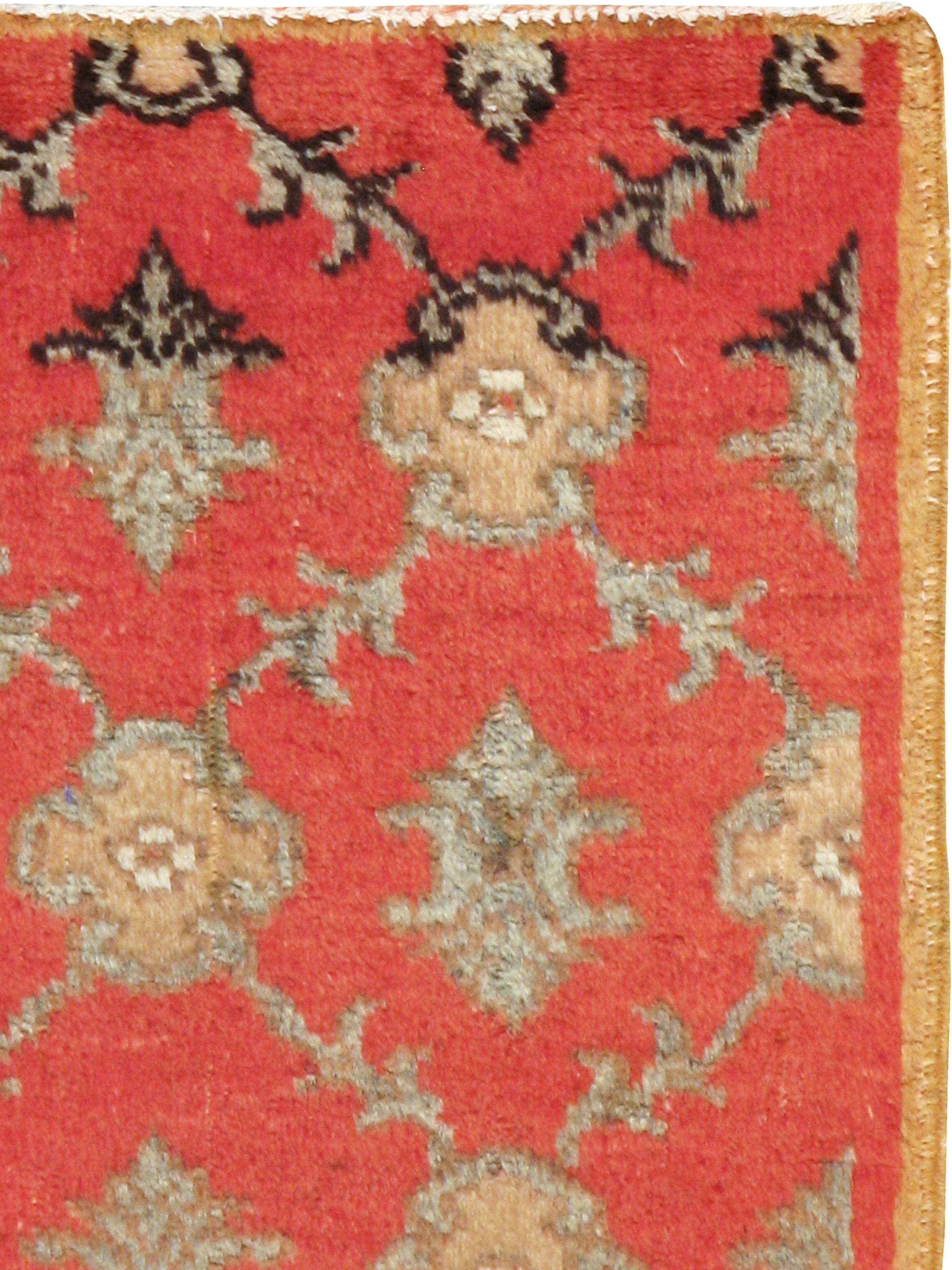A vintage Turkish Anatolian rug from the mid-20th century.

Measures: 2' 1