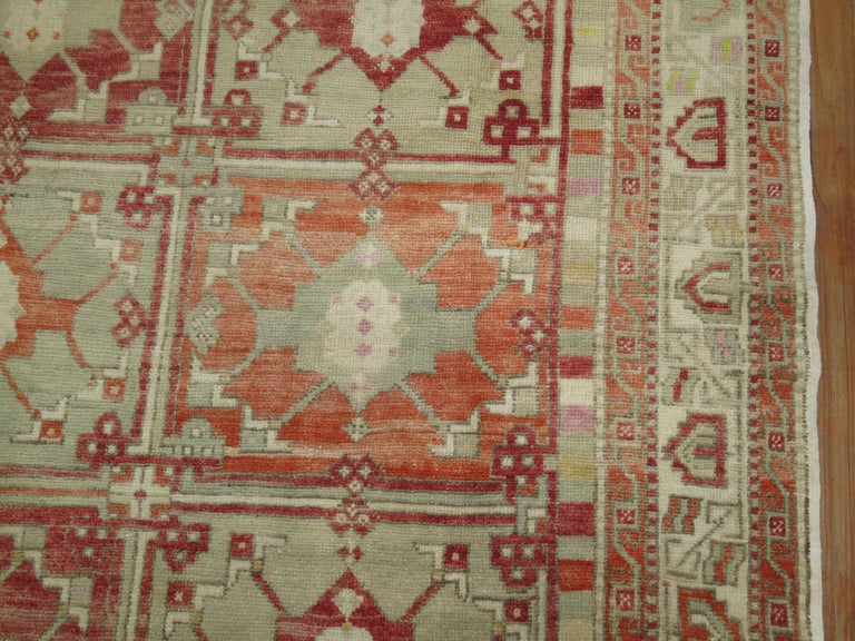 A mid-20th century one of a kind Turkish Anatolian square size decorative rug.
