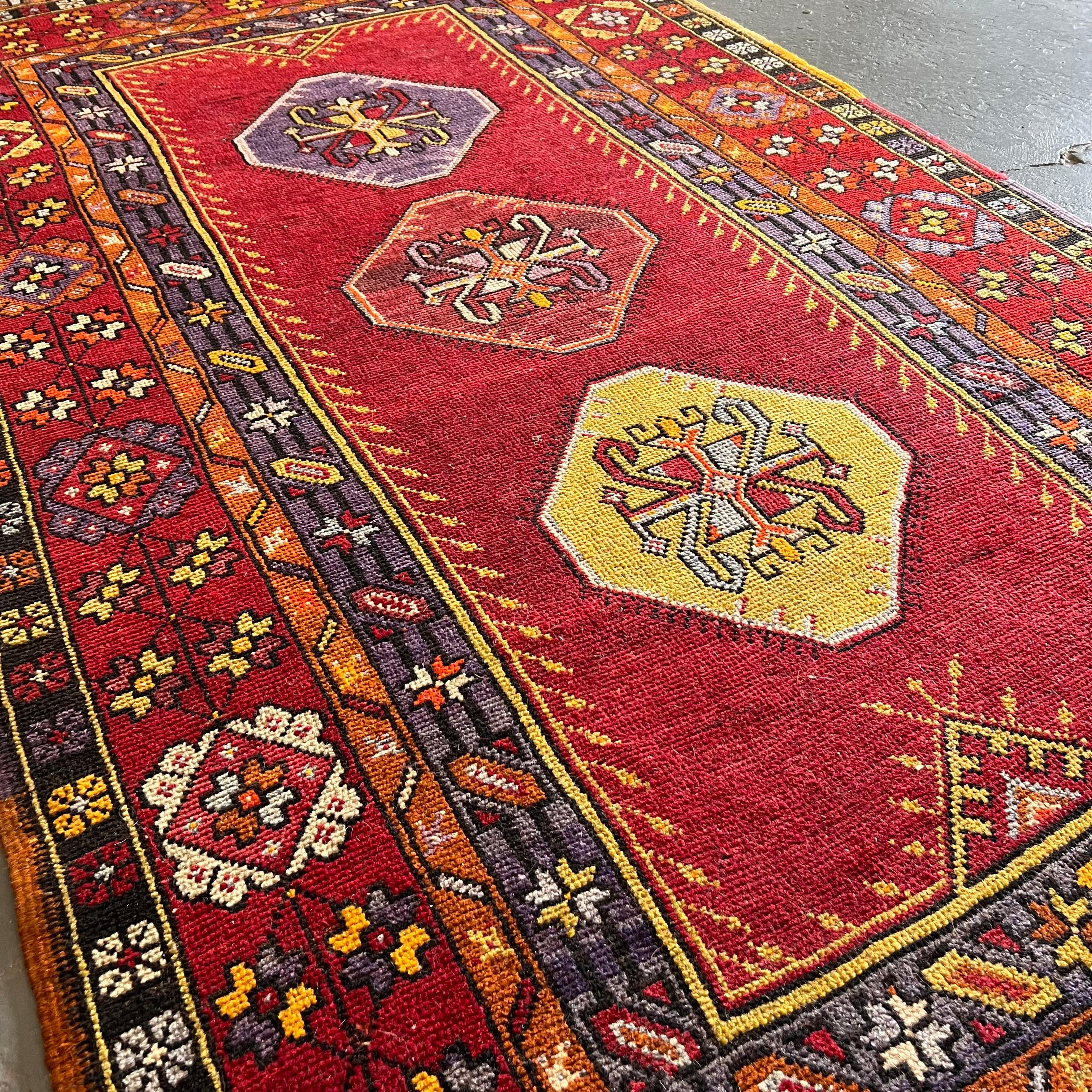 Wool Vintage Turkish Anatolian Rug, Reds and Purples For Sale