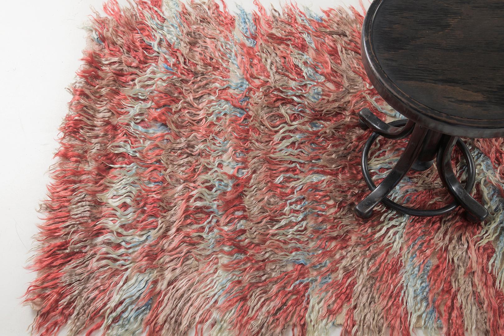 Tulu is a gorgeous wool shag that features amazing layers of variegated tones of blue and red. It augments the stunning scenery and all will be loved by the next generation. Turkish Anatolian rugs weave together dyes and colors, motifs, textures,