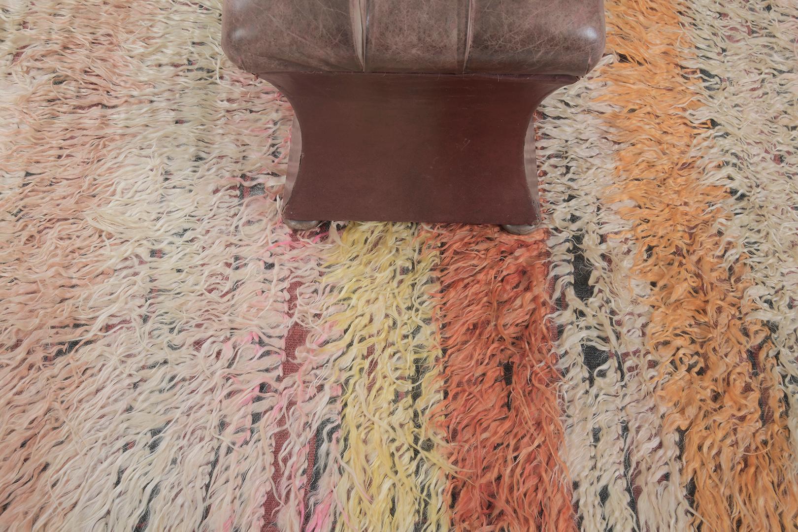 Tulu is a luxurious wool shag that features layers of variegated tones of rose, ivory, cream, peach, and nude. It augments the stunning scenery and all will be loved by the next generation. Turkish Anatolian rugs weave together dyes and colors,