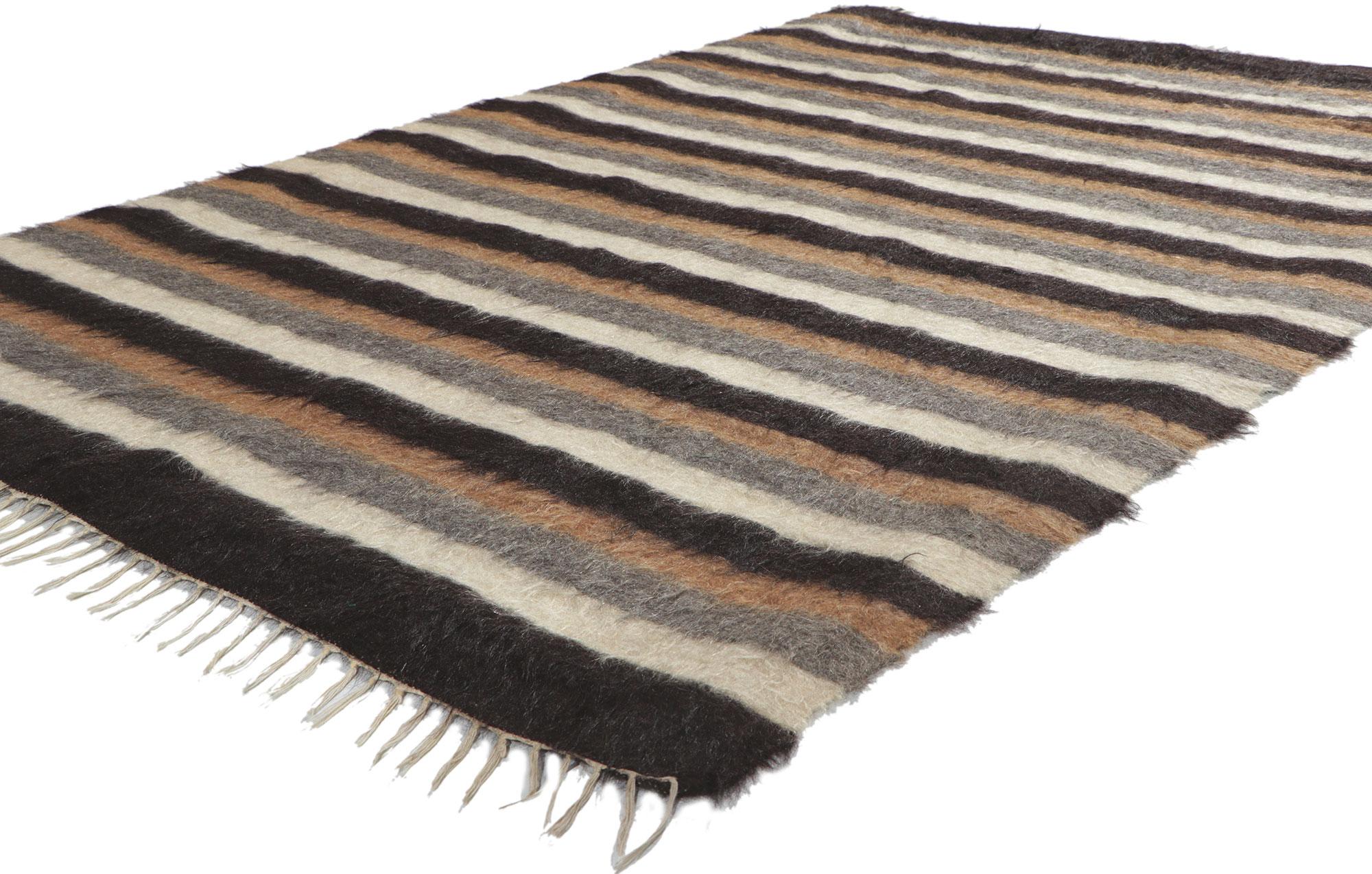 53835 vintage Turkish Angora wool Kilim rug, 04'01 x 06'00. With its shaggy pile, incredible detail and texture, this handwoven Turkish angora kilim rug is a captivating vision of woven beauty. The eye-catching striped pattern and earthy colorway