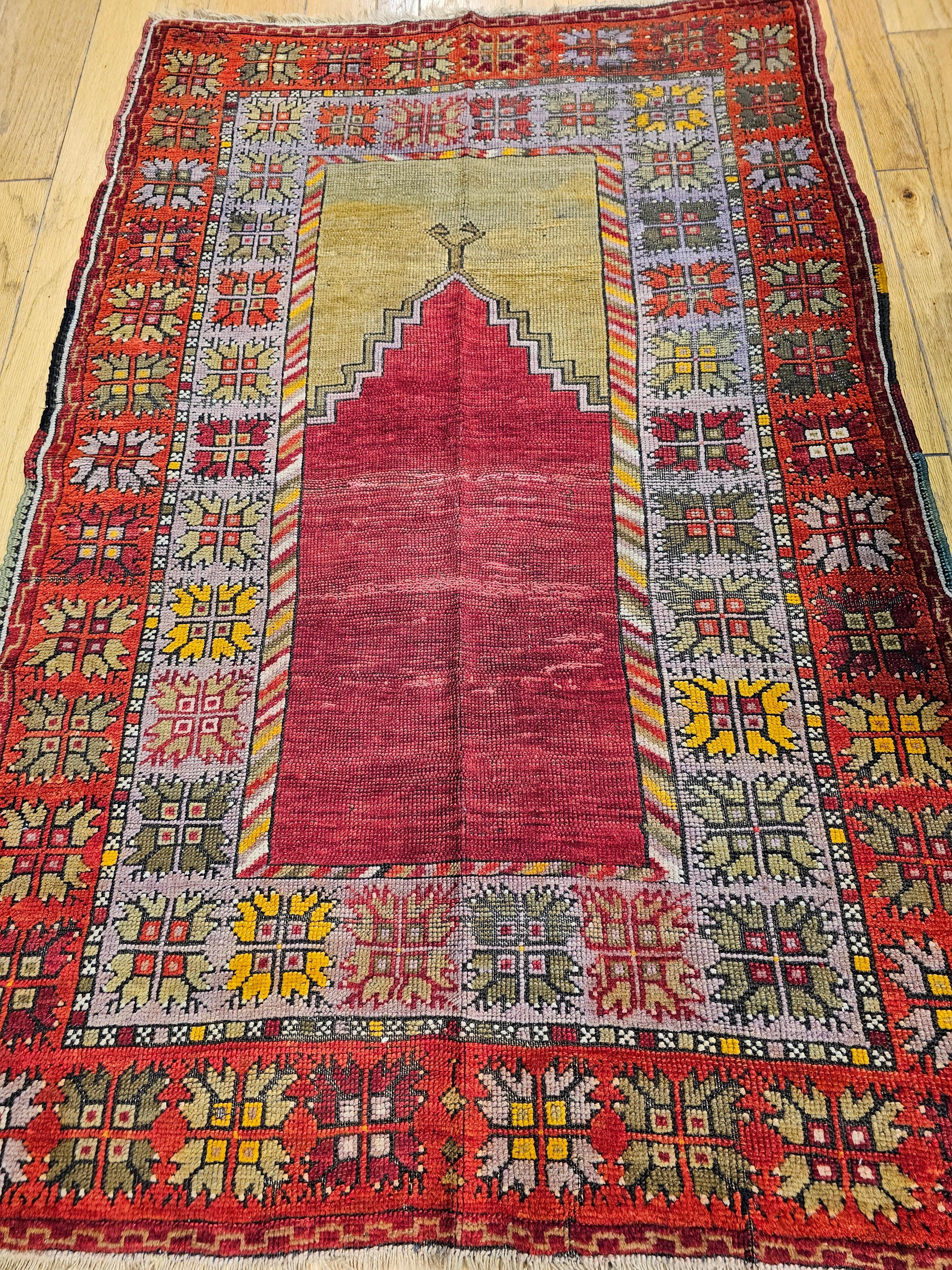 A beautiful Anatolian village rug in a prayer rug (Mihrab) design.  The rug was artistically woven in the early 1900s.  The use of natural organic vegetable dyes that mellow over time clearly shows the superiority of these rugs.  The rug has a pale