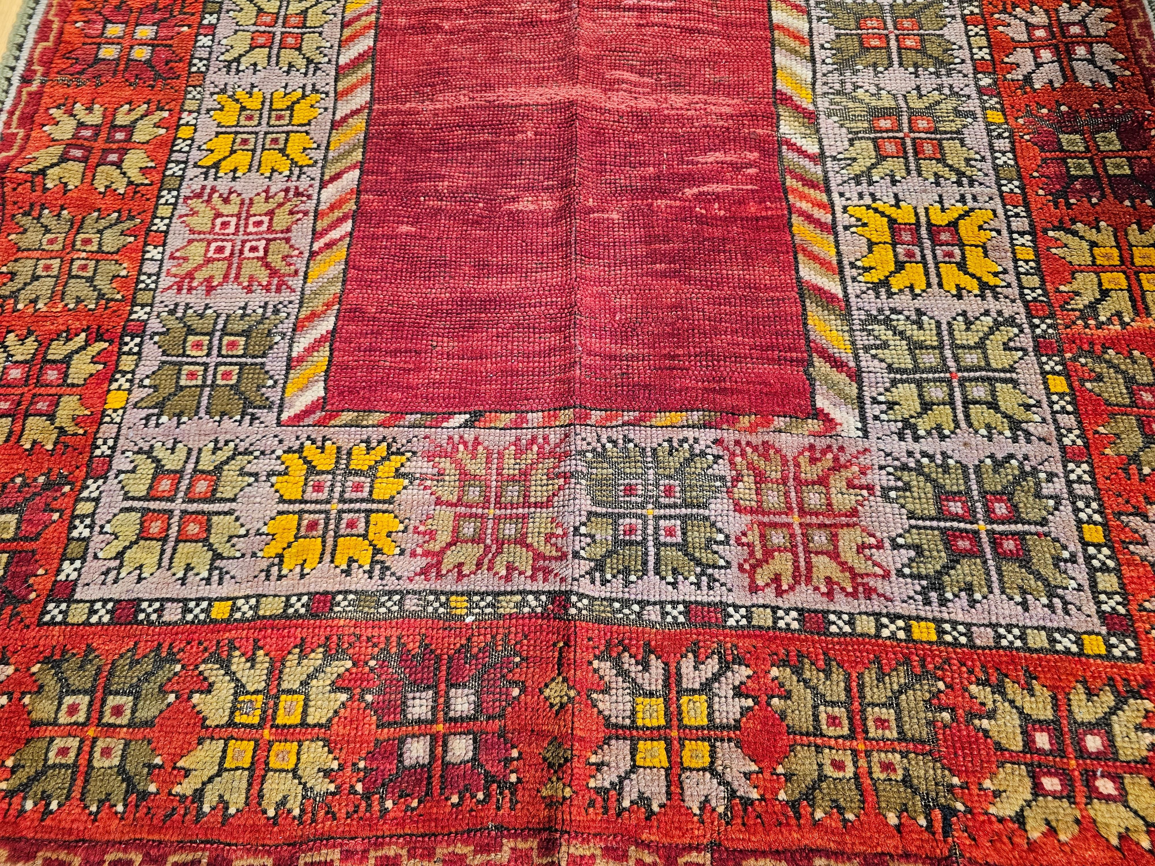 20th Century Vintage Turkish Prayer Area Rug in Fall Colors of Red, Yellow, Green, Purple For Sale