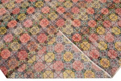 Türkischer handgefertigter rosa und gelber Floral-Wollteppich im Art-déco-Stil