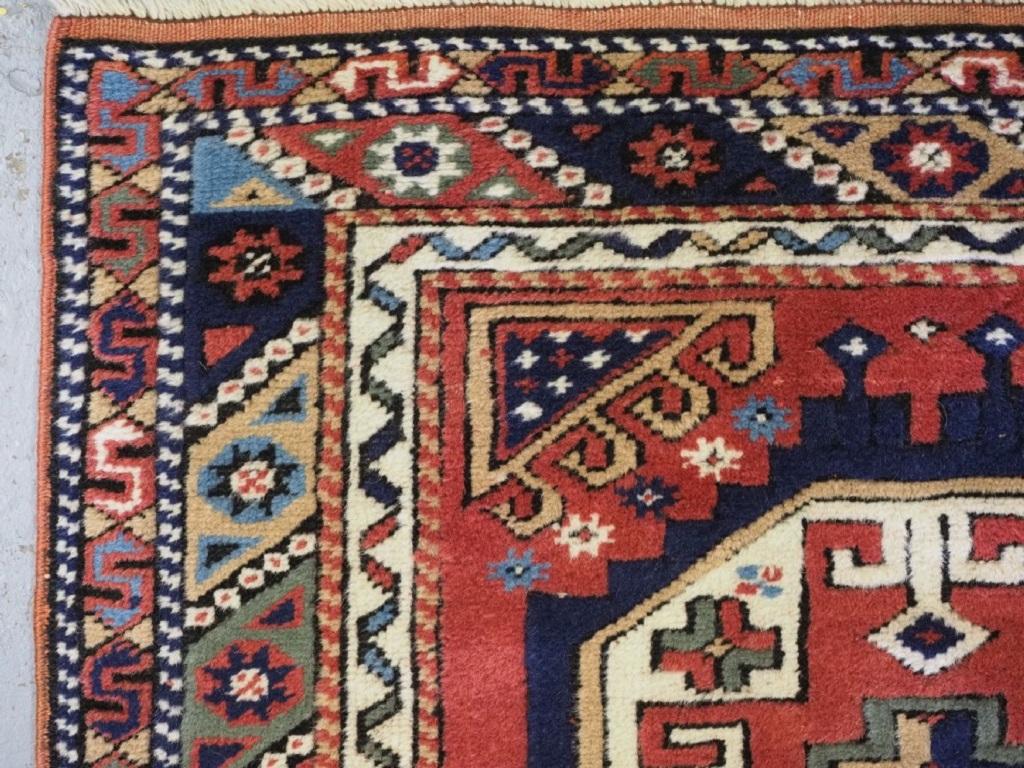 Vintage Turkish Bergama rug of traditional medallion design
About 60 years old

The rug has very pleasing colours with a soft red ground, the borders are particularly well drawn with a chevron and star design

The rug is in excellent condition with