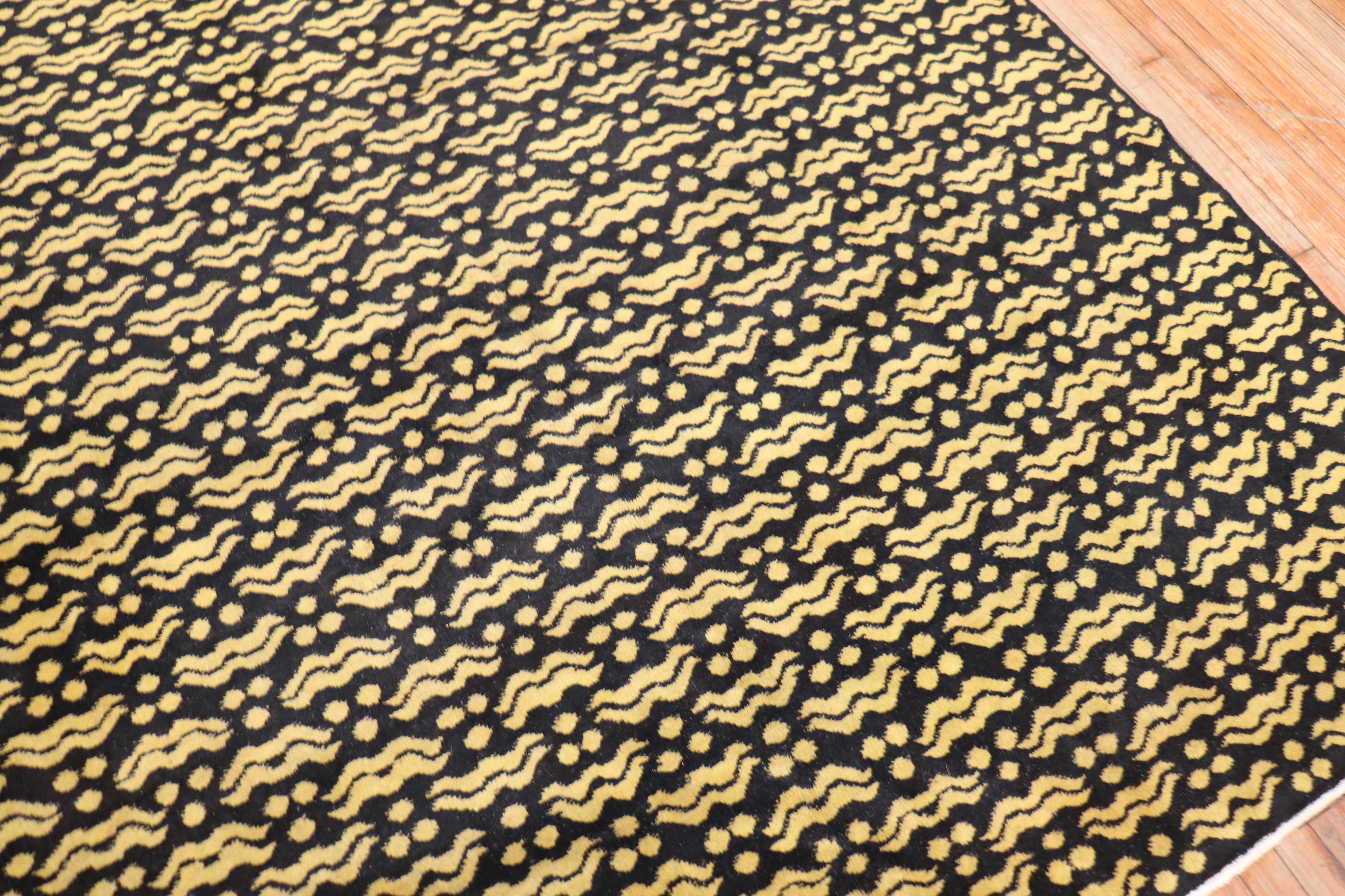 A midcentury handmade Turkish deco rug in black and yellow.

Measures: 7'1'' x 10'2''.