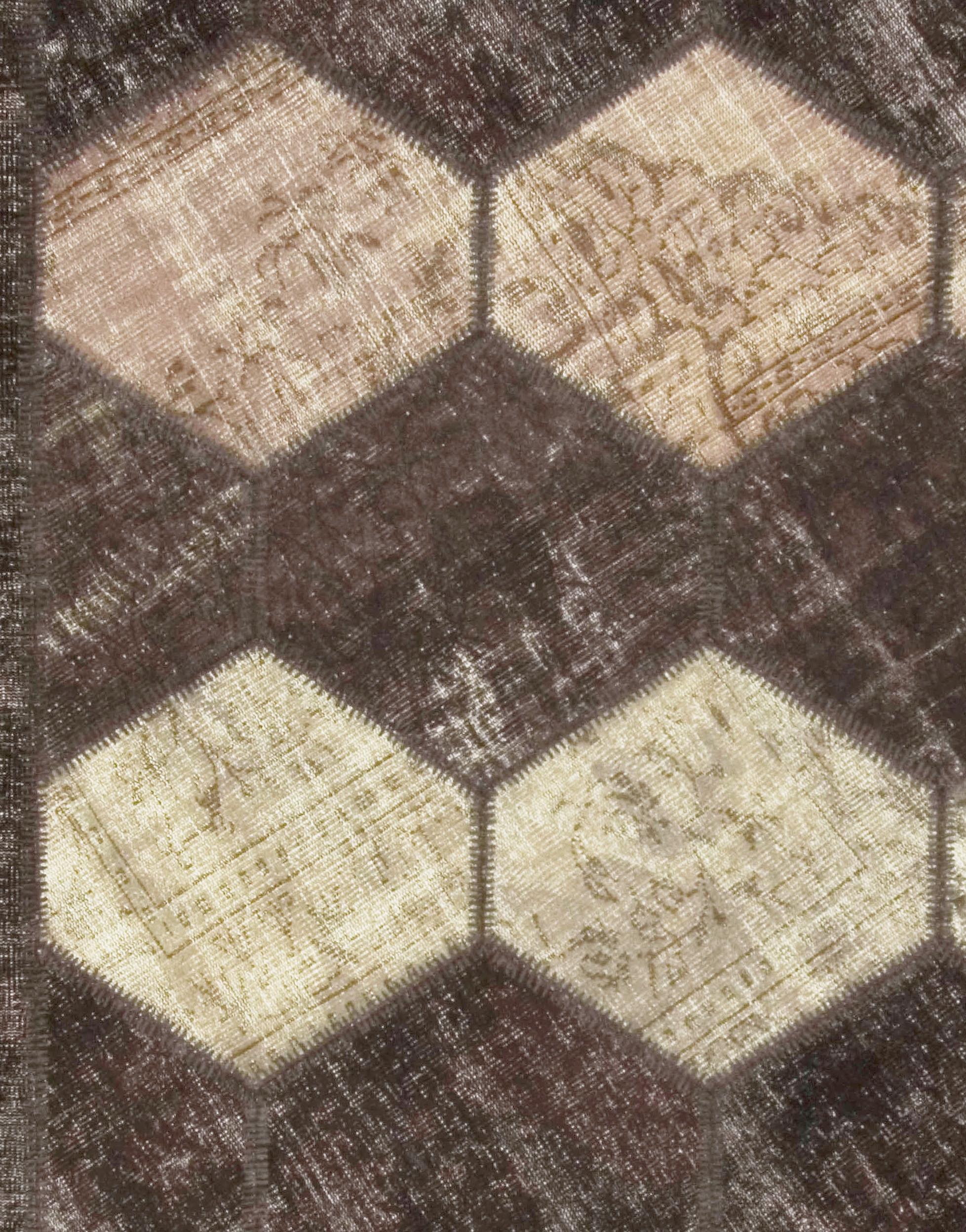 Vintage Turkish brown patchwork rug carpet 7'3 x 8'6. This rug is a combination from various hand knotted, circa 1950s pieces to create a patchwork rug which has been deliberately cut low to create this wonderful looking piece that will go so well