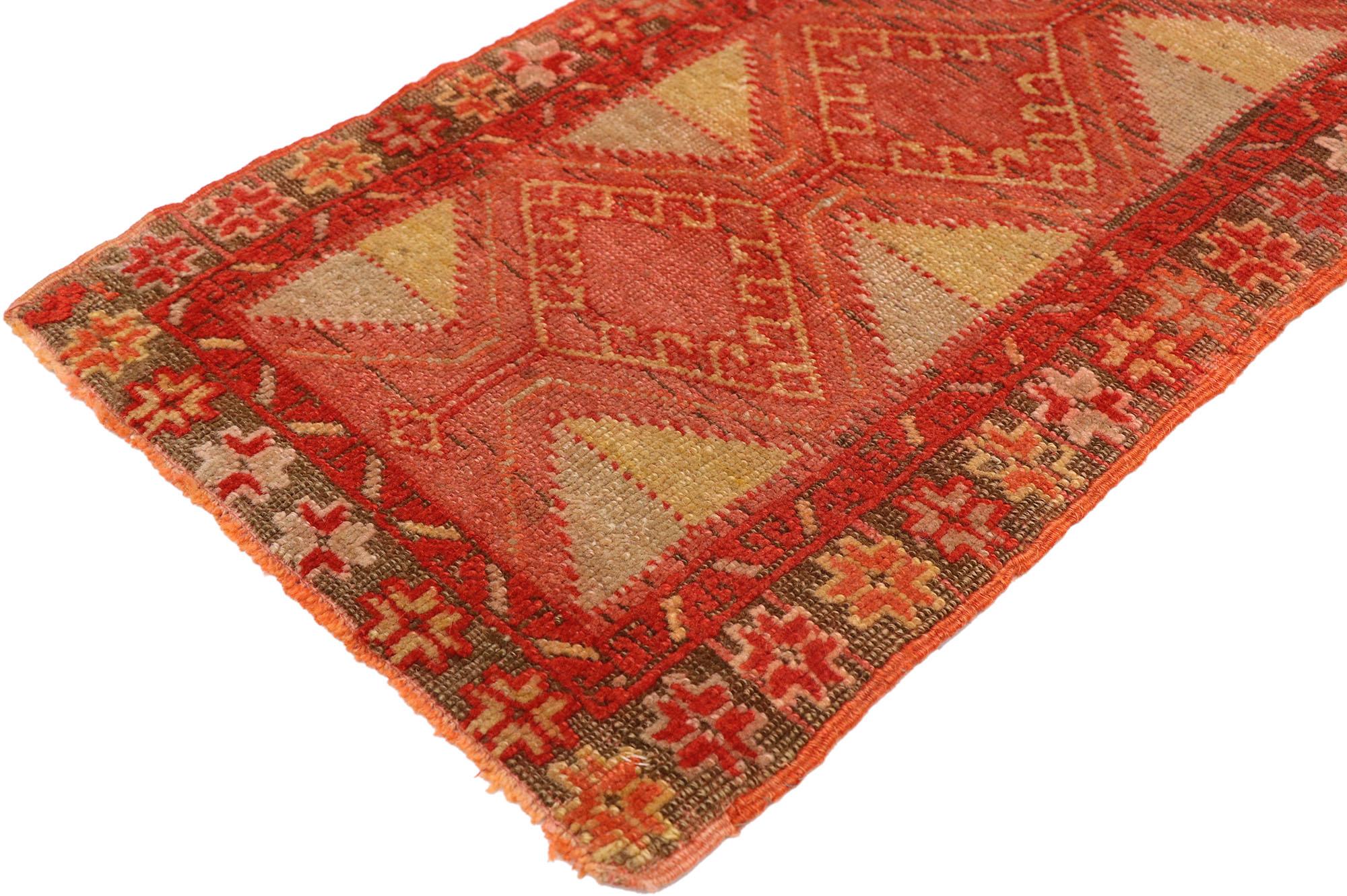 51179 Vintage Turkish Yastik Rug, 01'05 x 03'03. This captivating hand-knotted wool vintage Turkish Yastik rug embodies a timeless elegance, deeply rooted in nomadic charm and Anatolian cultural symbolism. Running through the heart of the