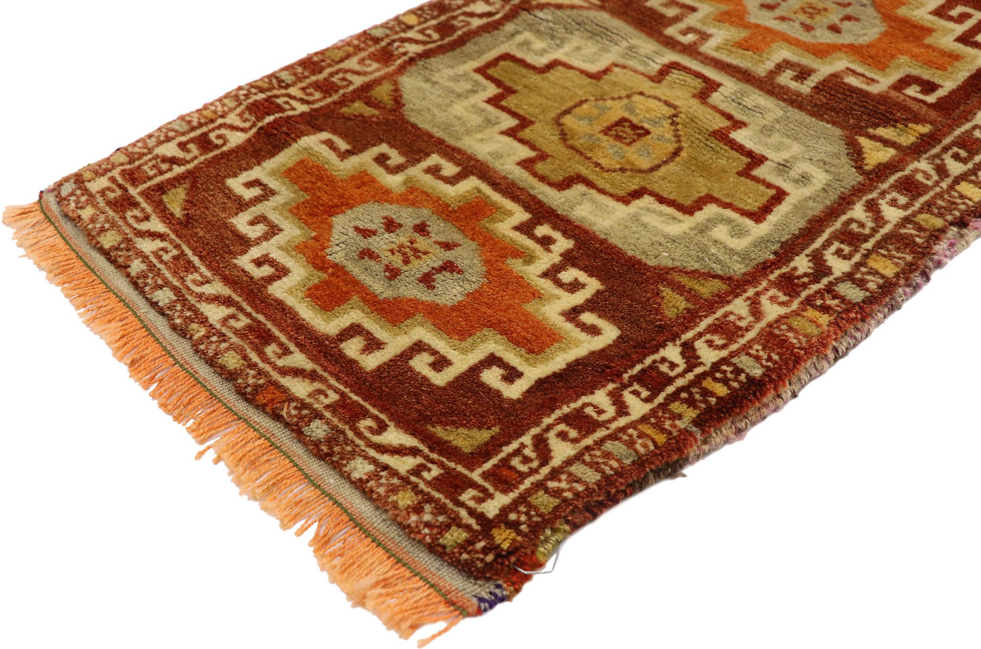 51220 Vintage Turkish Yastik Rug, 01'04 x 02'02. This captivating hand-knotted wool vintage Turkish Yastik rug showcases a timeless triple compartmental design, with each panel adorned with a bold and intricate dragon motif. The dragon, revered in