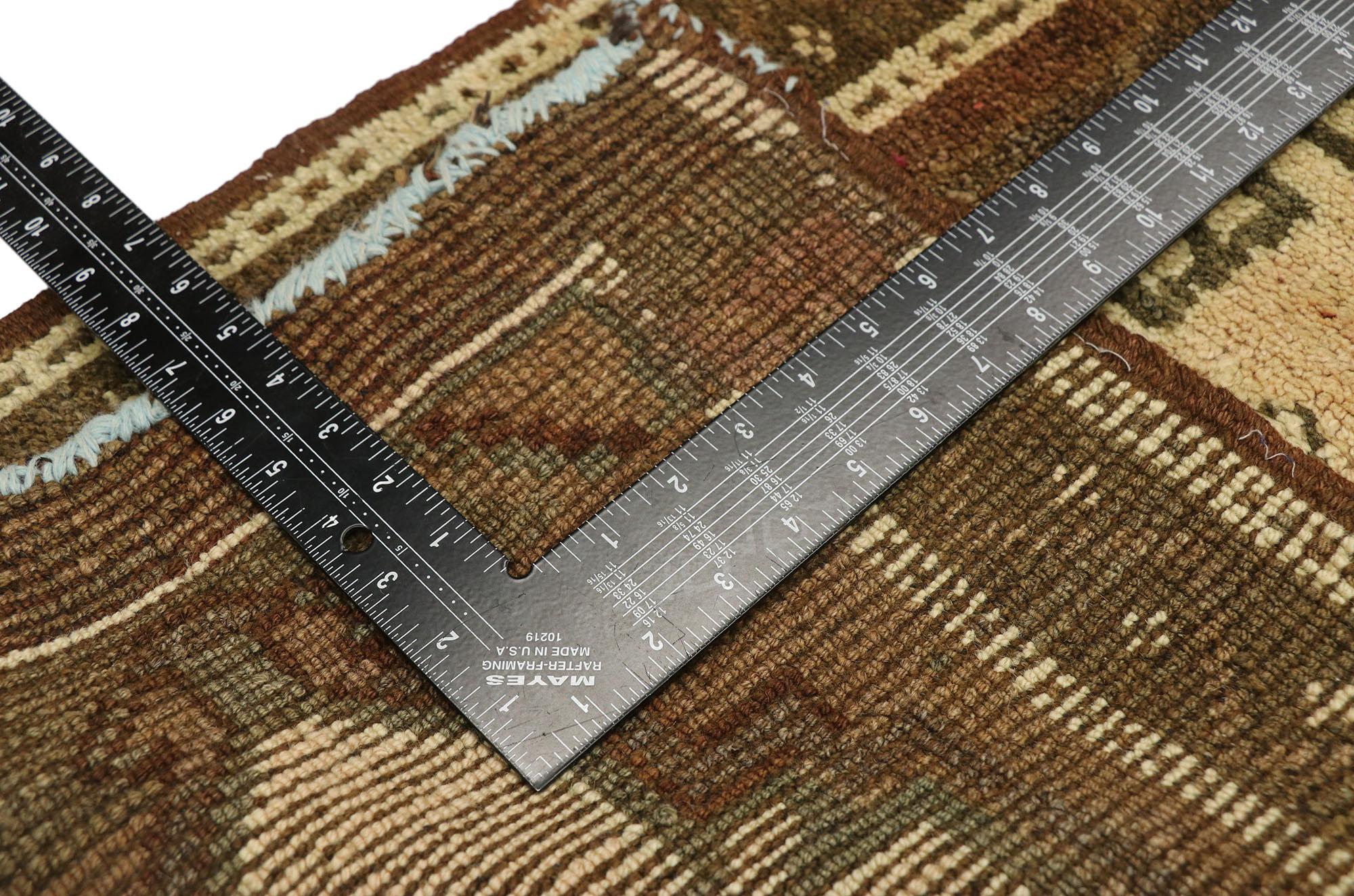 51824 Vintage Turkish Yastik Rug, 01'10 x 03'00. This hand-knotted wool vintage Turkish Yastik rug is a charming example of Anatolian craftsmanship, rich in history and character. The composition features a central field in a warm beige adorned with