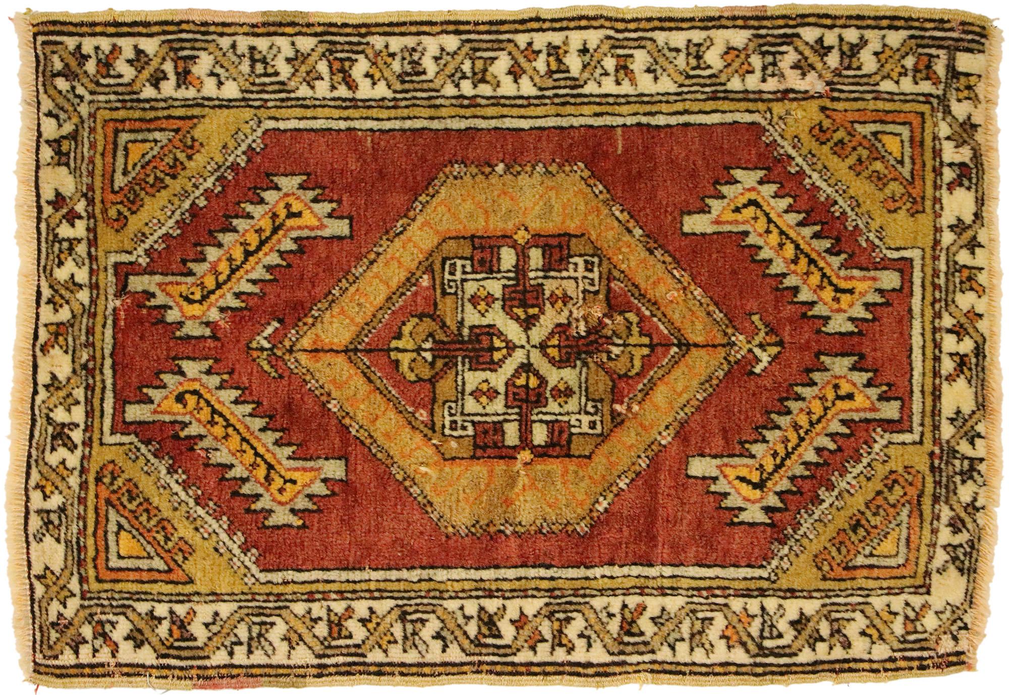 51829 Vintage Turkish Yastik Rug, 01'08 x 02'05. This hand-knotted wool vintage Turkish Yastik rug exudes a vibrant and dynamic energy that is characteristic of Anatolian weaving traditions. The rug's design centers around a striking diamond-shaped