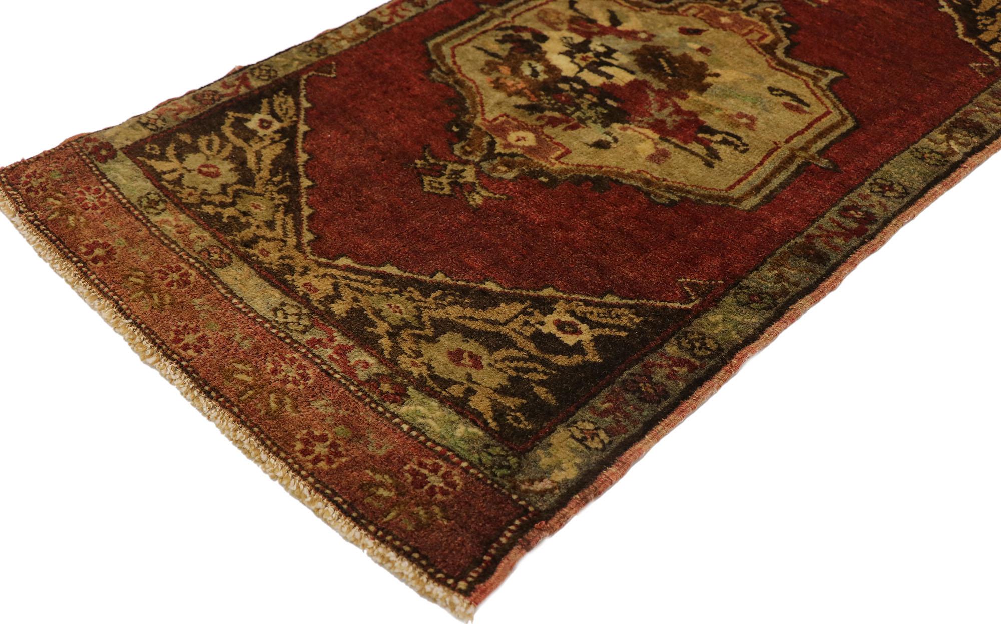 51512 Vintage Turkish Yastik Rug, 01'09 x 03'02. This hand-knotted wool vintage Turkish Yastik rug exudes a sense of timeless elegance and rich Anatolian cultural heritage. The rug's central medallion, rendered in soft shades of olive green,