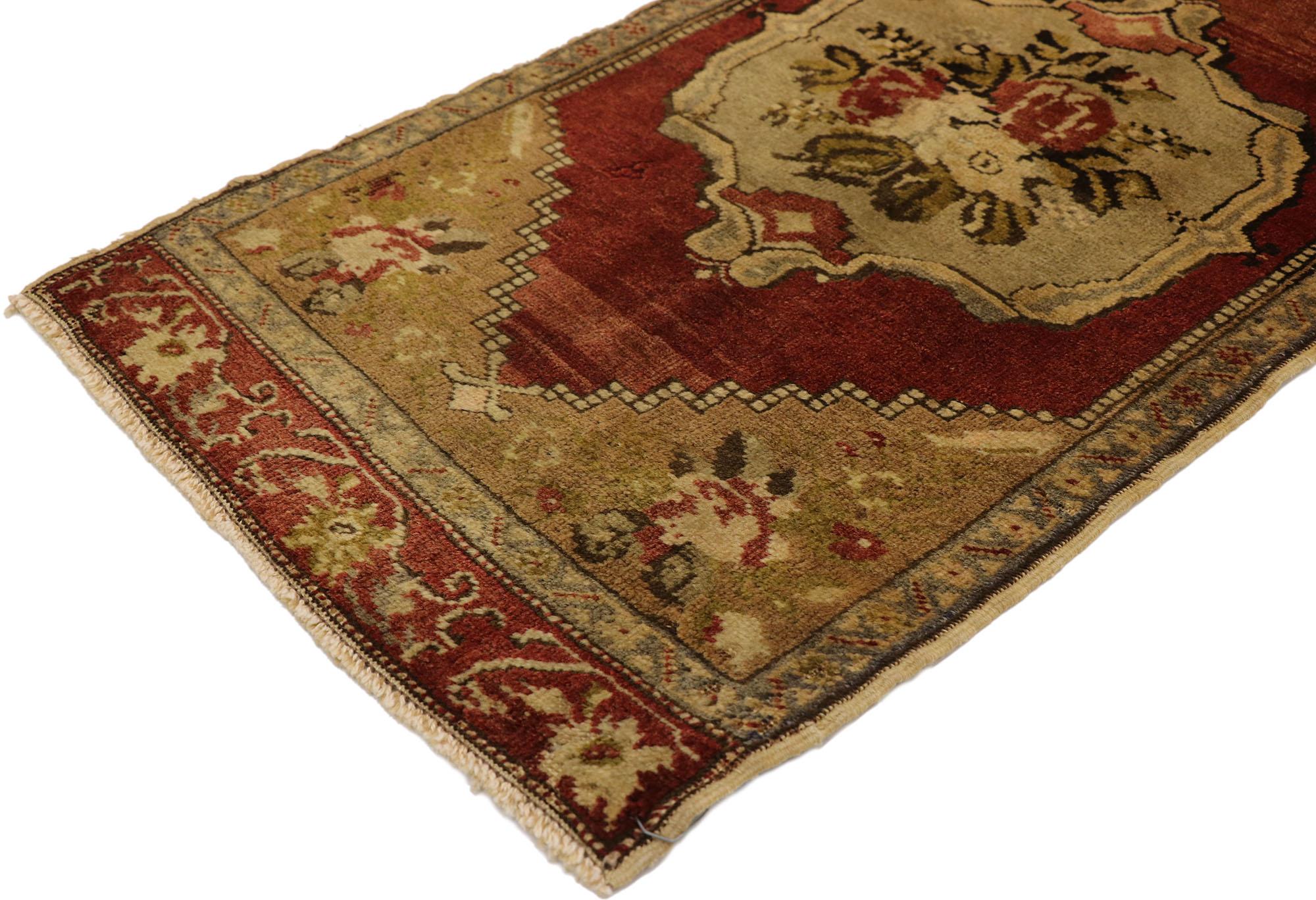 51510 Vintage Turkish Yastik Rug, 01'07 x 03'02.​ This hand-knotted wool vintage Turkish Yastik rug is a captivating example of the beauty and tradition of Anatolian weaving. The rug features a rich red field that immediately commands attention,