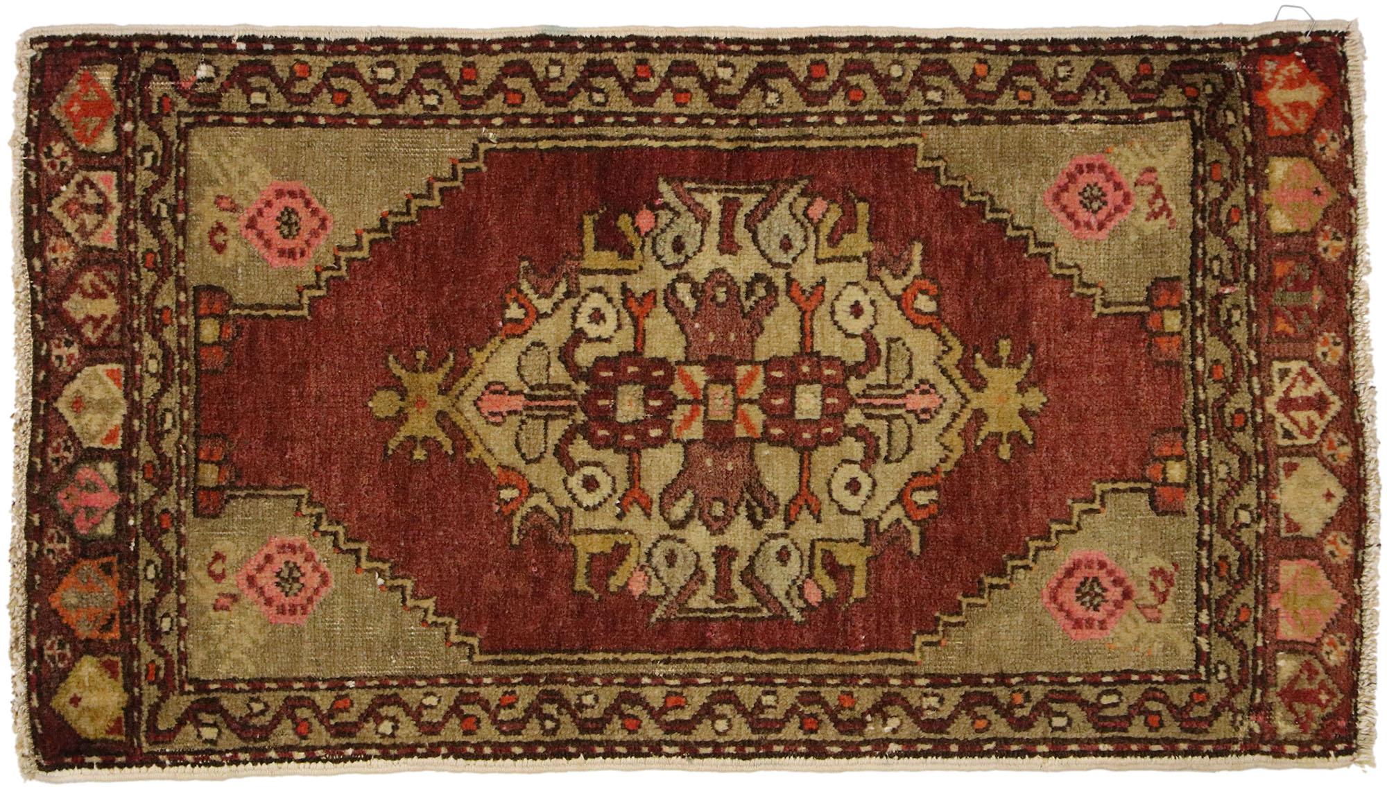 51482 Vintage Turkish Yastik Rug, 01'06 x 02'07. This hand-knotted wool vintage Turkish Yastik rug is a captivating example of traditional Anatolian craftsmanship, offering a warm and inviting aesthetic that is both timeless and versatile. The