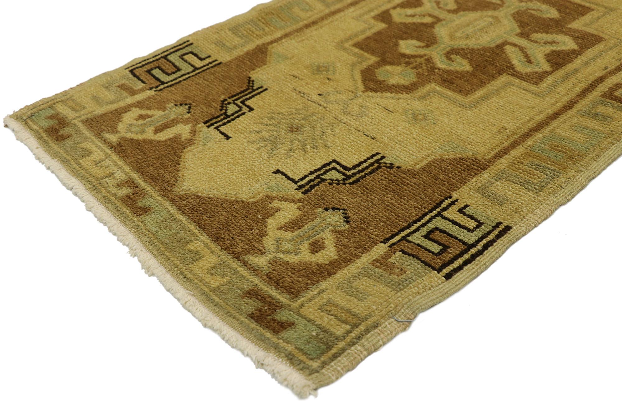50982 Vintage Turkish Yastik Rug, 01'09 x 03'03. This captivating hand-knotted wool vintage Turkish Yastik rug captures the essence of traditional Anatolian artistry with its geometric patterns and harmonious earth-tone colors. The tan field serves