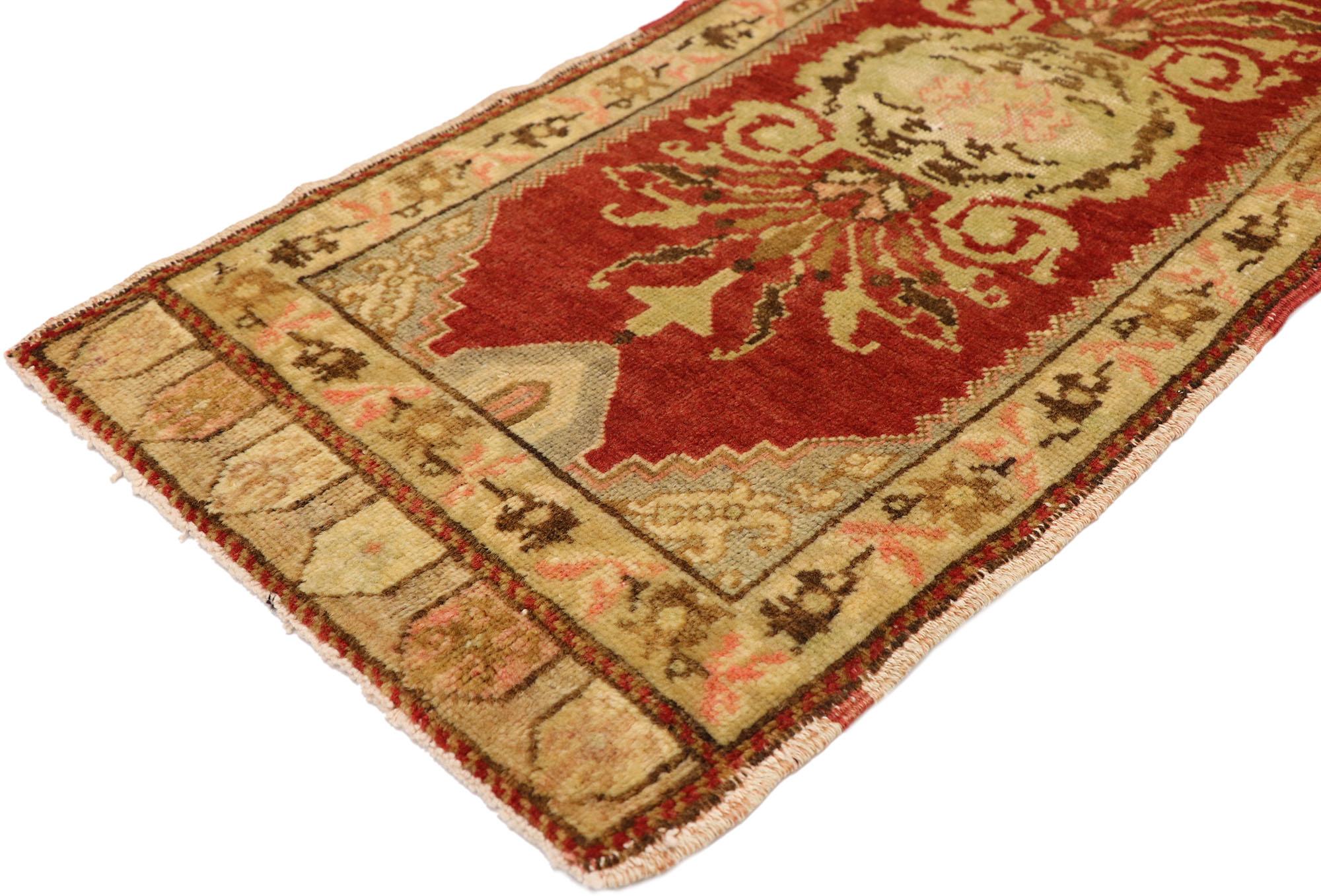 51187 Vintage Turkish Yastik Rug, 01'06 x 03'07. This enchanting hand-knotted wool vintage Turkish Yastik rug captures the essence of romantic Rococo with a distinctly feminine sensibility. The open red field serves as a rich and passionate backdrop