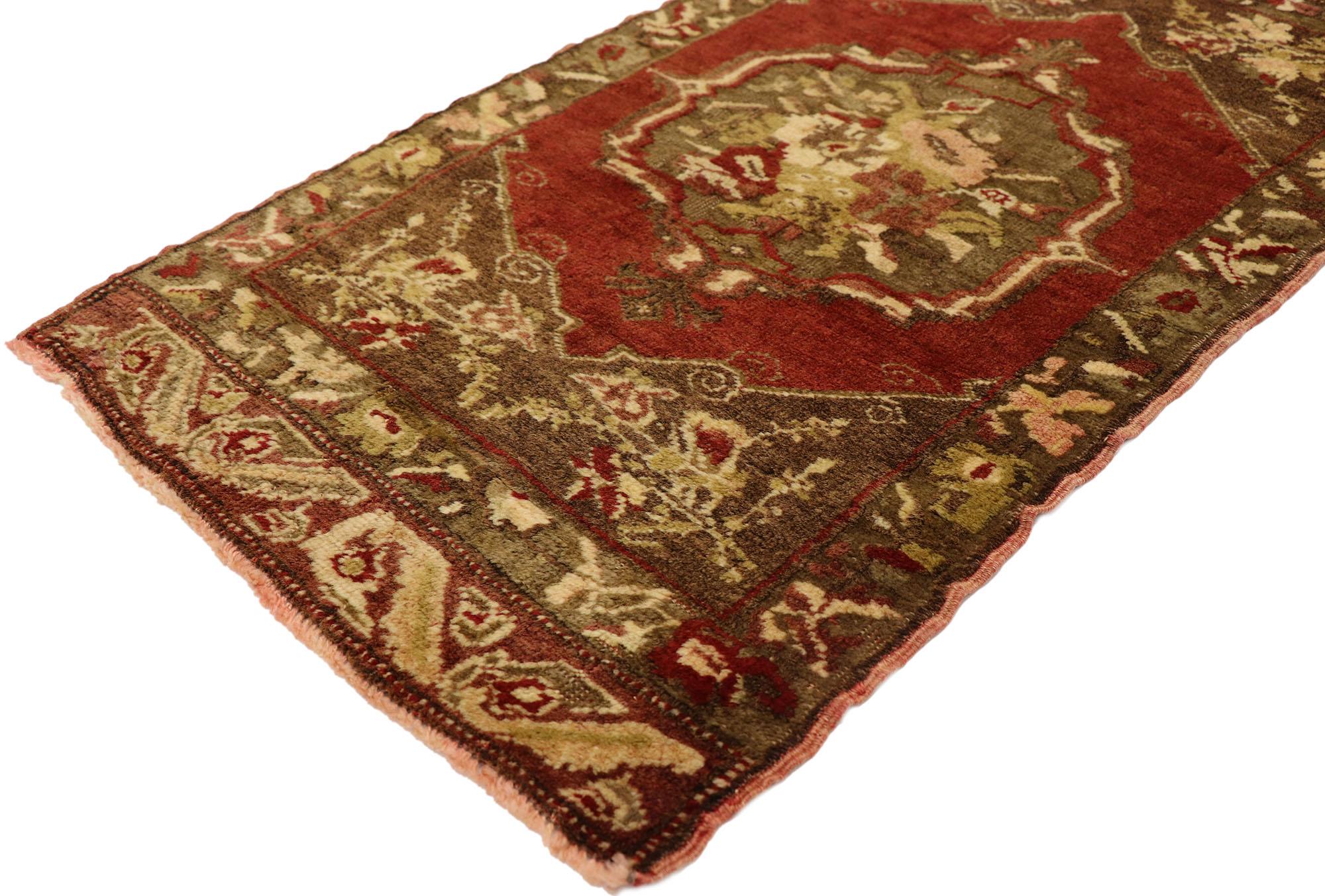 51411 Vintage Turkish Yastik Rug, 01'09 x 03'00. This hand-knotted wool vintage Turkish Yastik rug is a stunning piece of art that exudes a romantic Rococo, feminine sensibility. The rug's open red field provides a warm and inviting backdrop that