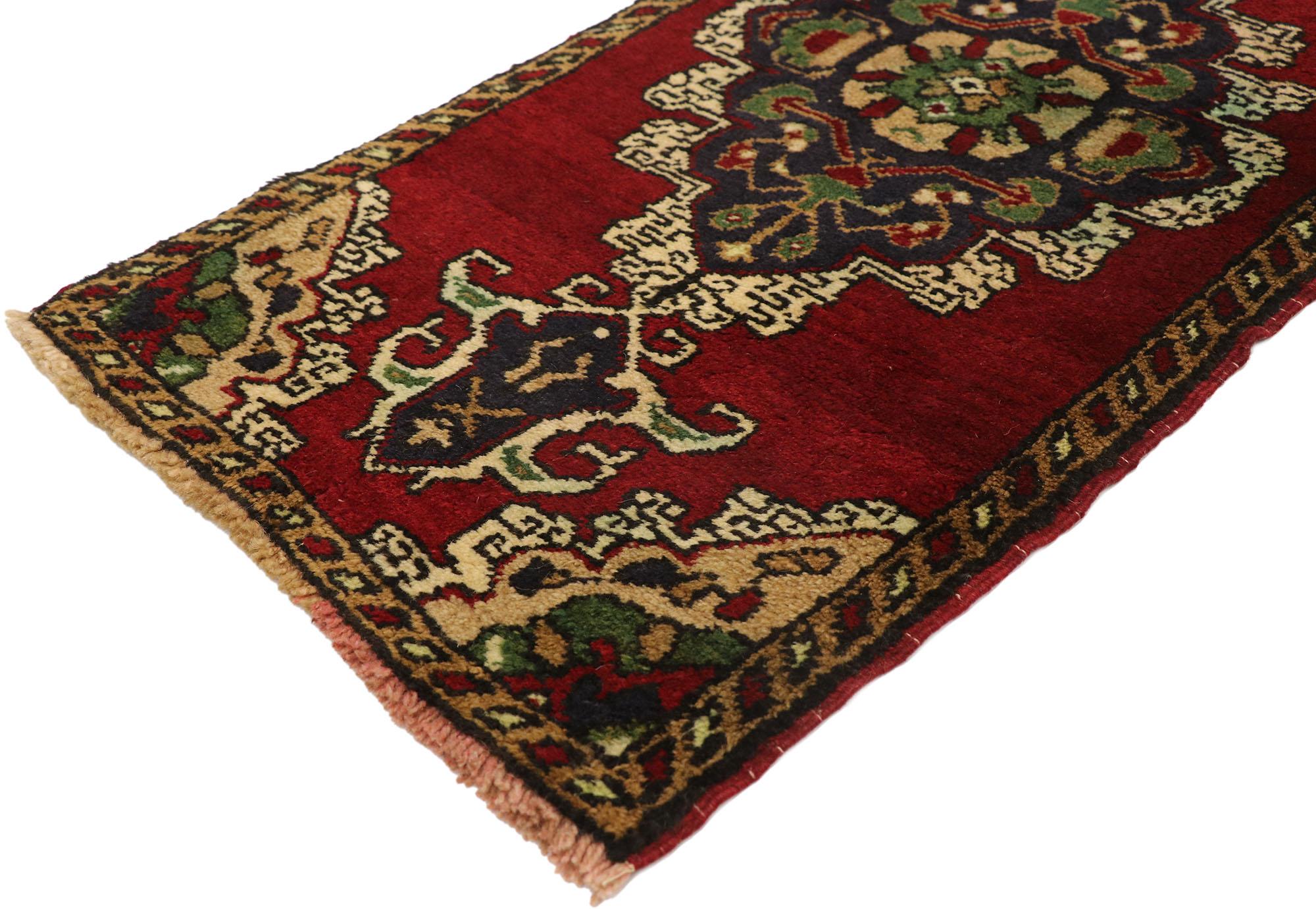 51473 Vintage Turkish Yastik Rug, 01'08 x 03'04. This hand-knotted wool vintage Turkish Yastik rug captures the essence of Anatolian craftsmanship with its striking design and rich palette. The rug’s deep red field sets a dramatic stage for the