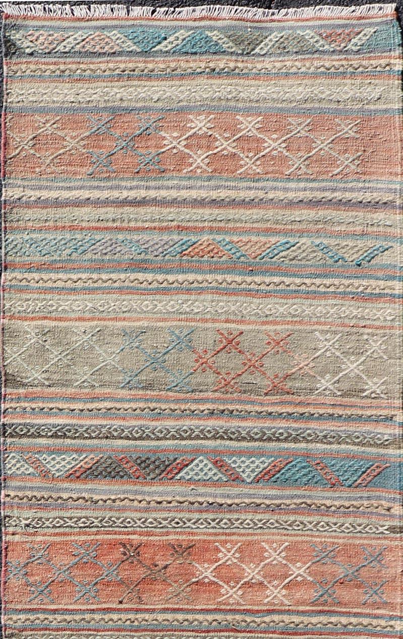 Measures: 2'7 x 9'7 
Vintage Turkish Colorful Kilim Runner with Stripe Design in Tan and Orange's. Keivan Woven Arts / rug TU-NED-5005, country of origin / type: Turkey / Kilim, circa 1950.
Featuring a striking stripe design, this unique 1950s Kilim