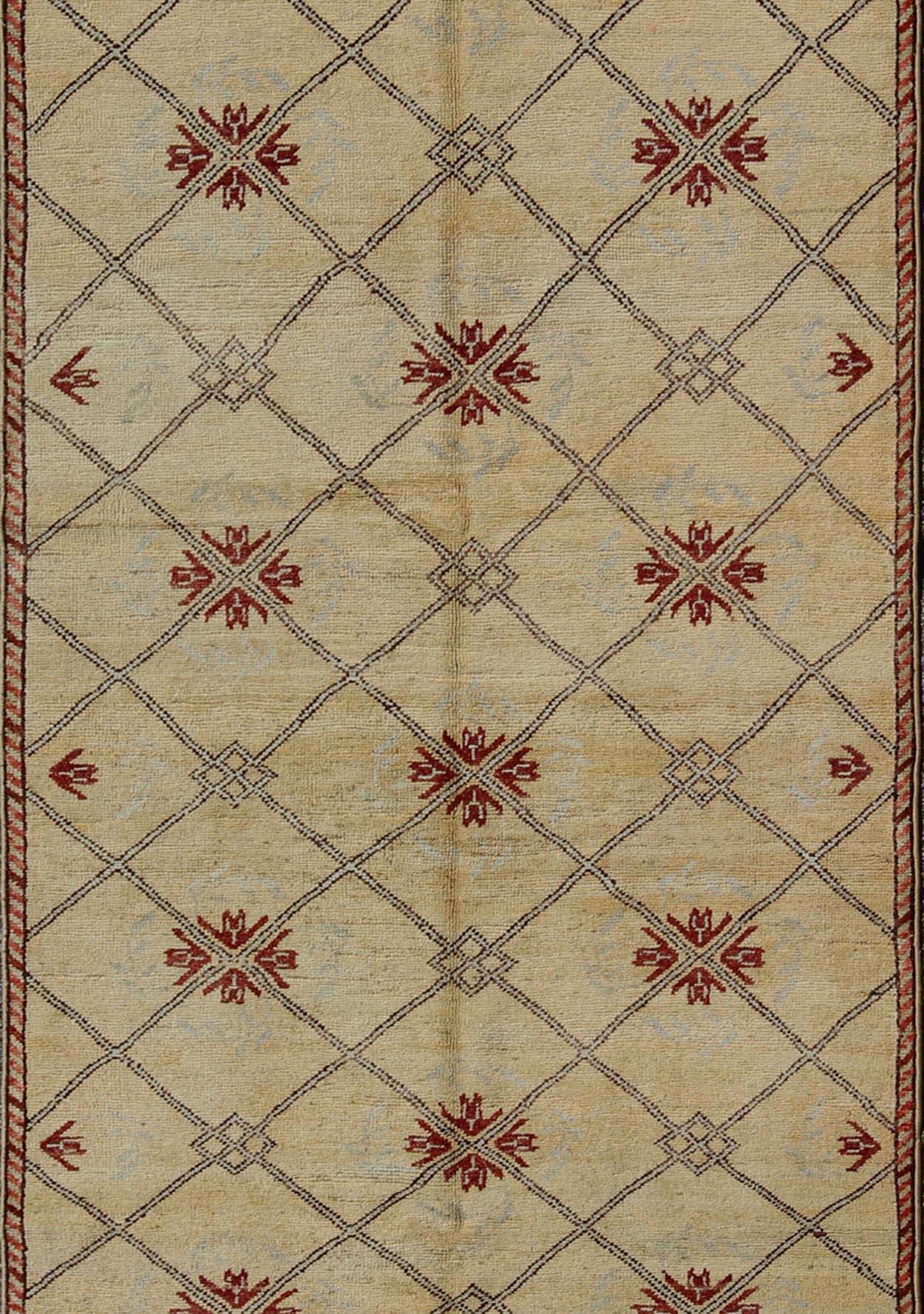Vintage Turkish Cross-Hatch Trellis Design Oushak Rug by Keivan Woven Arts

Measures: 4'2 x 9'7

This 1940's Turkish Oushak features a cross hatch design with sub-geometric motifs in the crossings. The field is rendered in a creamy yellow, with