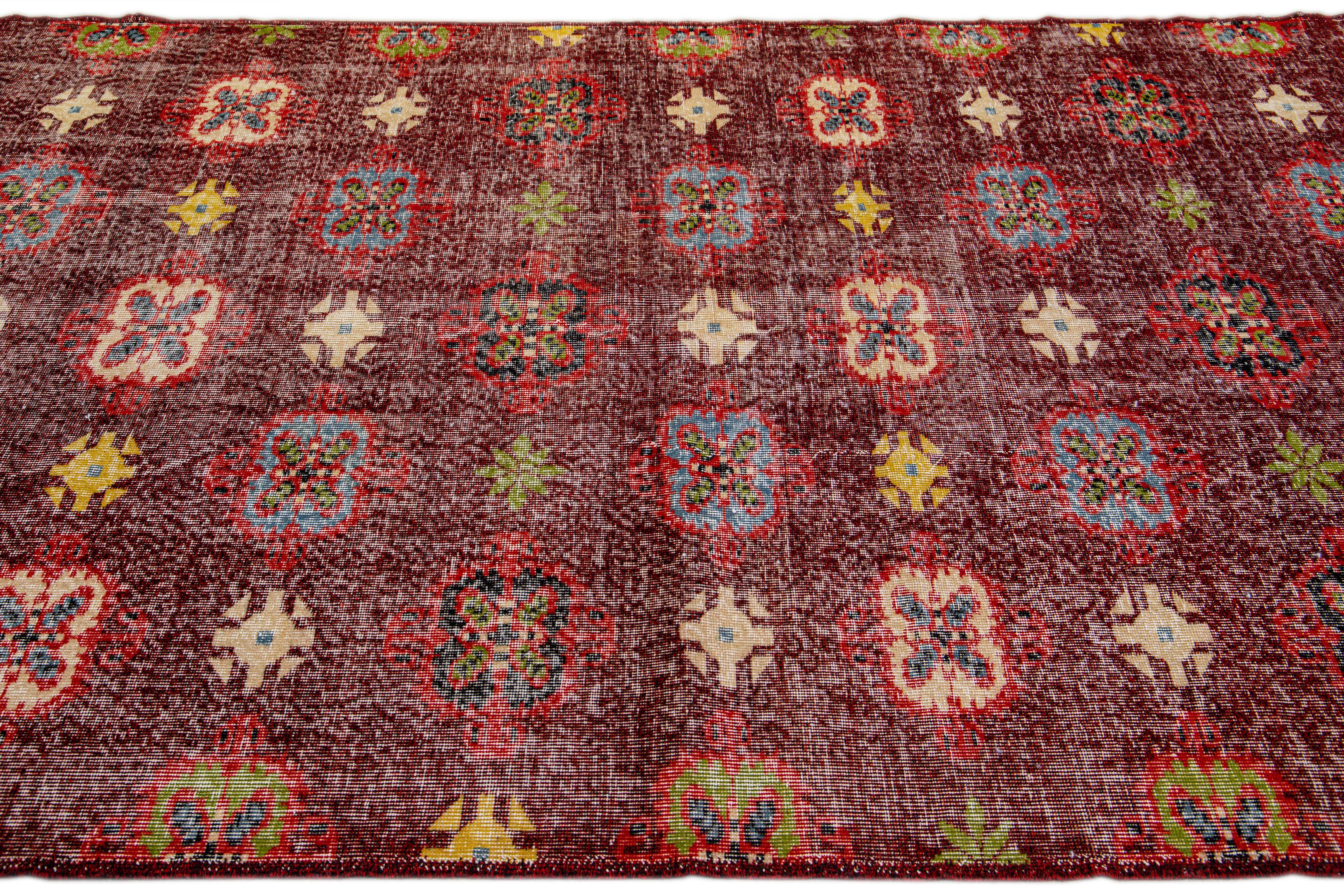 Vintage Turkish Deco Handmade Floral Pattern Burgundy Wool Rug In Distressed Condition For Sale In Norwalk, CT