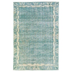 Türkischer Deko-Teppich aus Wolle mit floralem Muster in Teal, handgefertigt