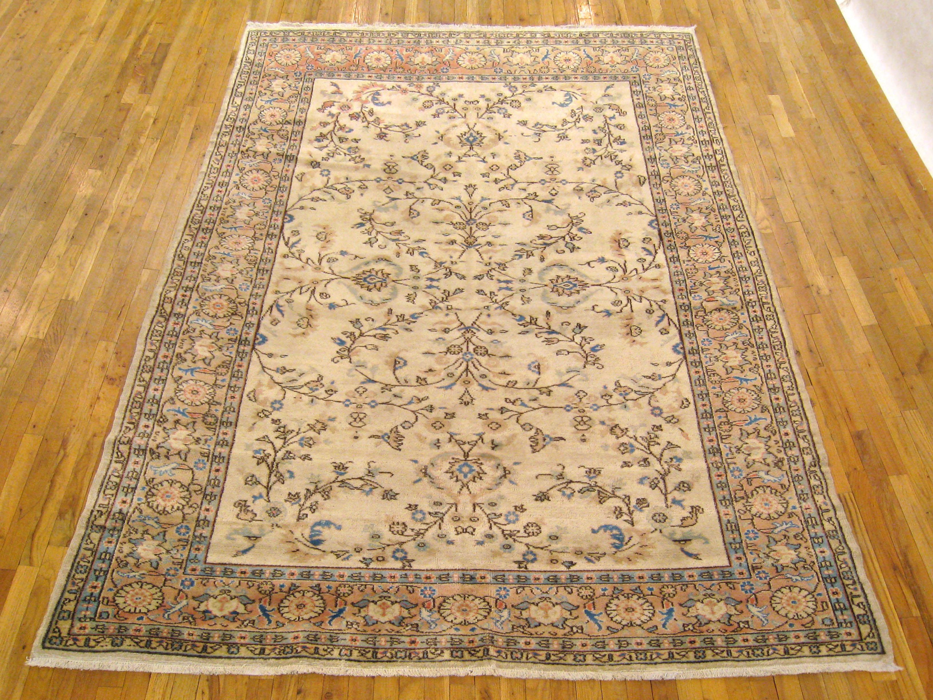Antique Turkish oushak decorative oriental carpet, room size, with ivory field

A gorgeous antique Turkish Oushak carpet, circa 1900, size 10'1