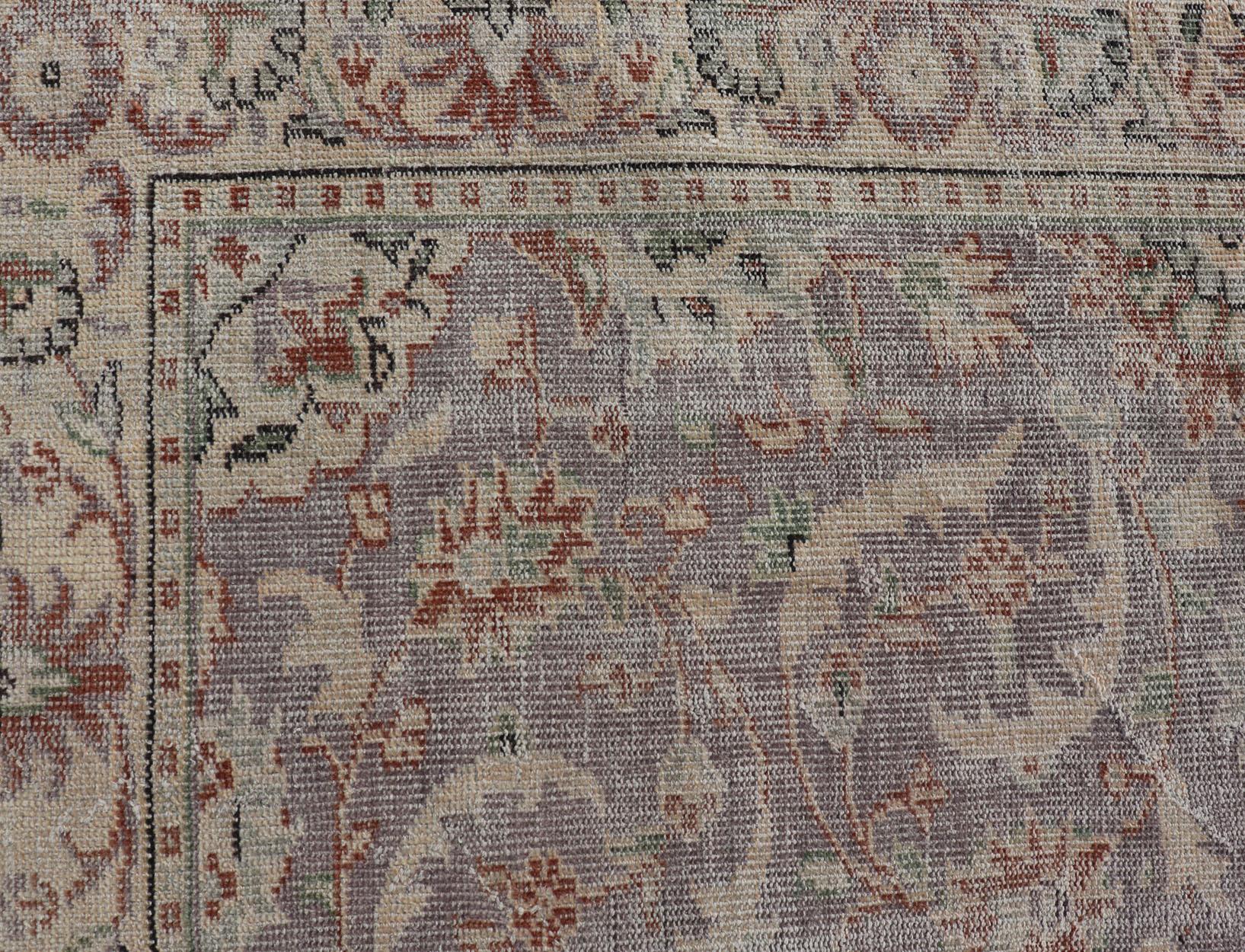 Vintage Turkish distressed oushak rug with all-over floral Design in Lilac color. Keivan Woven Arts / rug EN-P13614, country of origin / type: Turkey / Oushak, circa Mid-20th century.

This vintage Turkish Oushak rug has been hand-knotted in wool