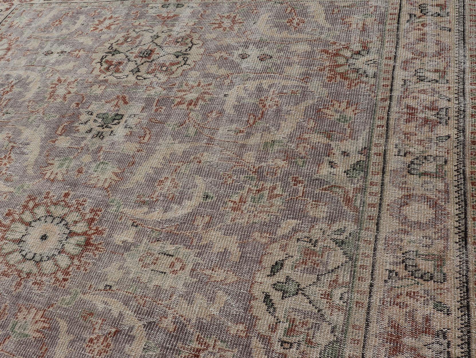 20th Century Vintage Turkish Distressed Oushak Rug with All-Over Floral Design in Lilac Color For Sale