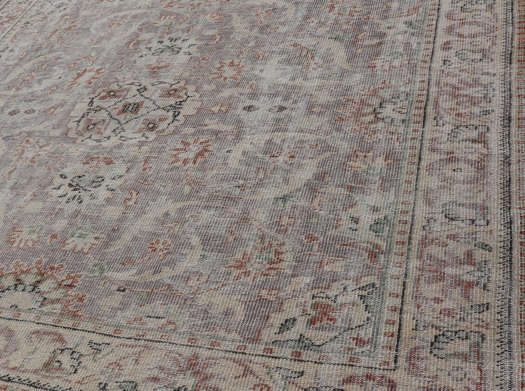 Wool Vintage Turkish Distressed Oushak Rug with All-Over Floral Design in Lilac Color For Sale