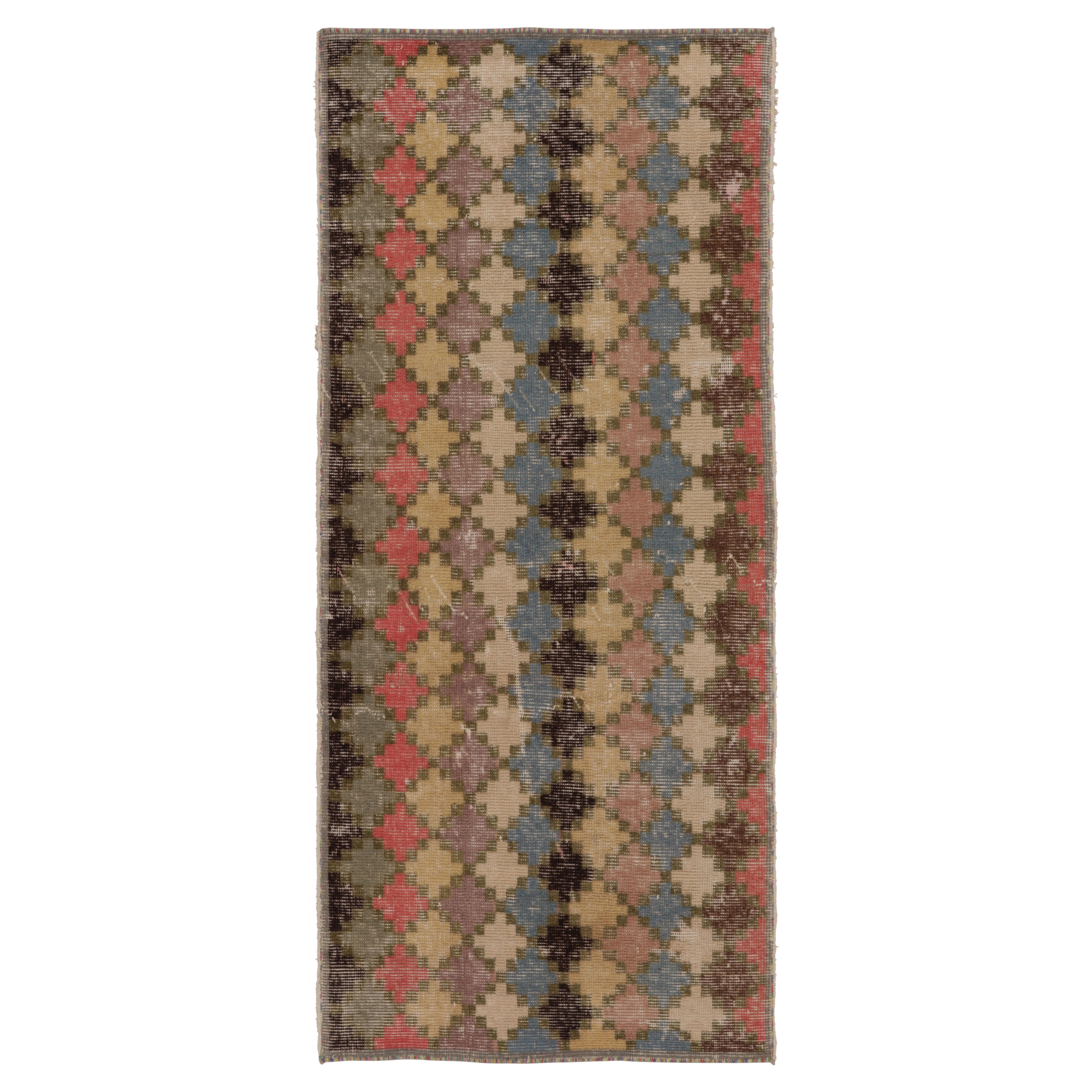 Türkischer Vintage-Teppich mit polychromen Rautenmustern - Rug & Kilim