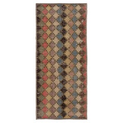 Türkischer Vintage-Teppich mit polychromen Rautenmustern - Rug & Kilim