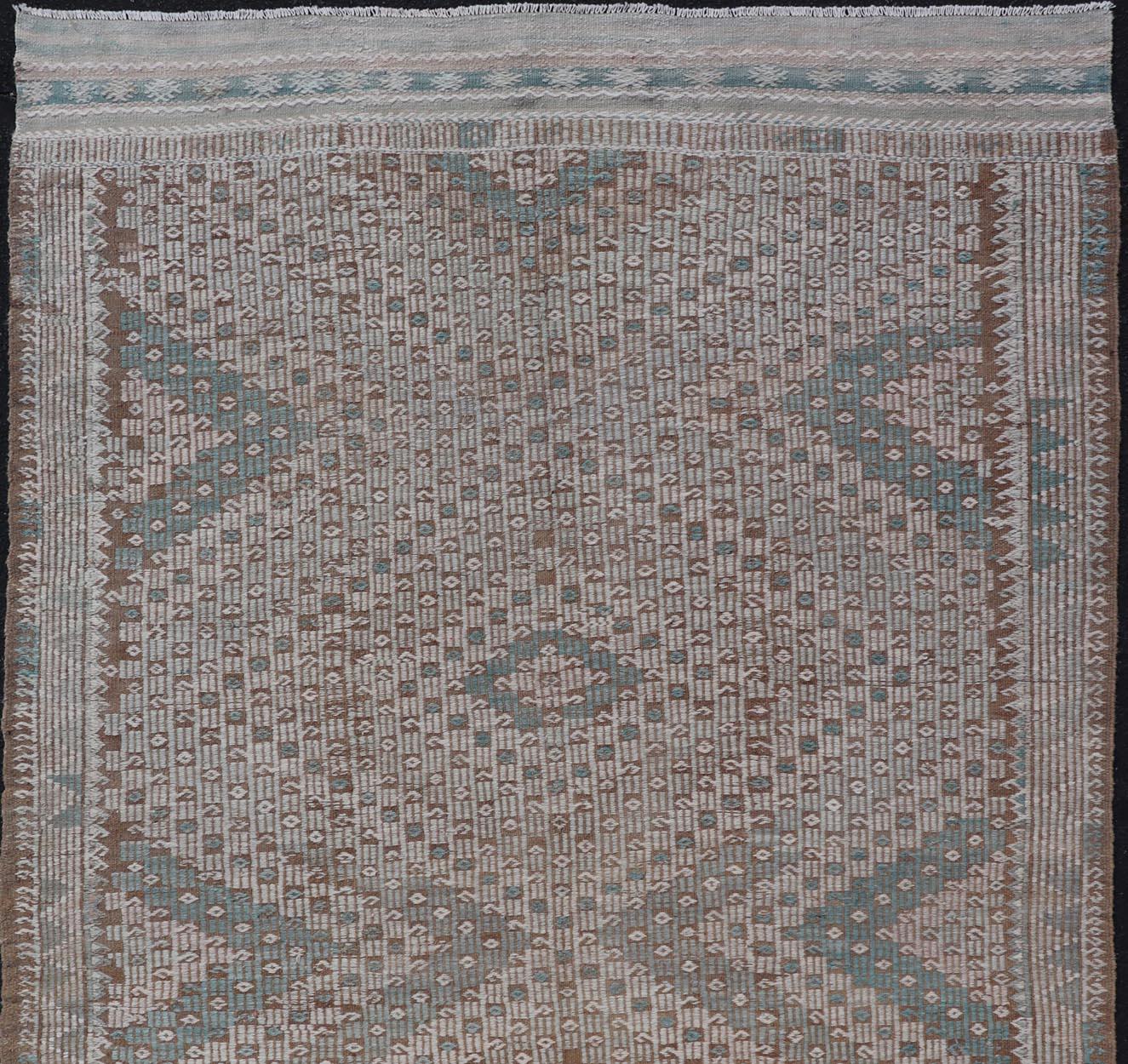 Vintage Turkish embroidered flat-weave rug with neutral-toned geometric design.
Keivan Woven Arts- Geometric design vintage Kilim rug from Turkey in pale green, cream, neutral, muted tones, rug EN-13466, country of origin / type: Turkey / Kilim,