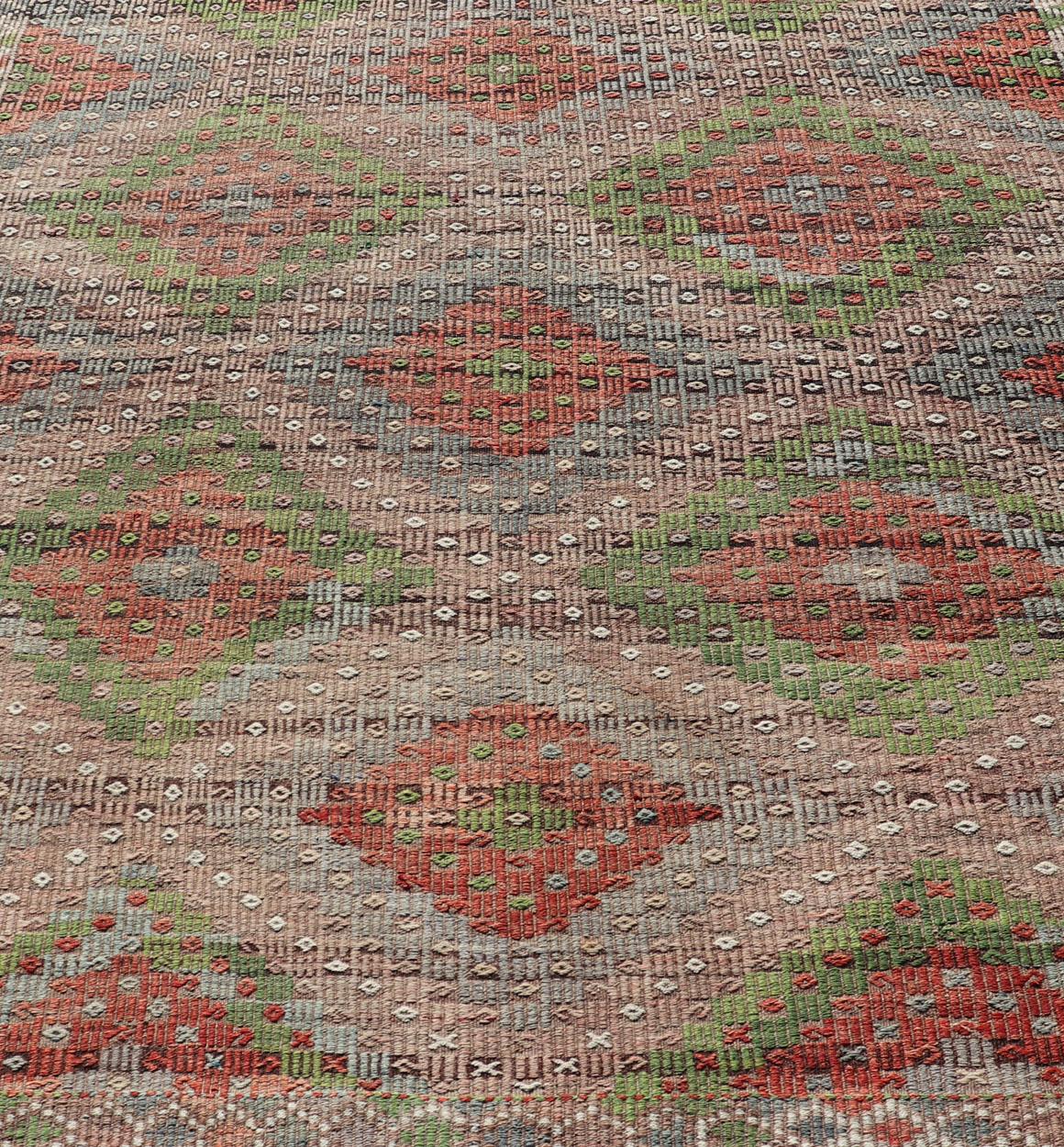 Measures: 7'1 x 8'1 
Vintage Turkish Embroidered Flat-Weave Rug with Geometric Design With Green. Keivan Woven Arts- Geometric design vintage Kilim rug from Turkey rug EN-14459, country of origin / type: Turkey / Kilim, circa 1950.