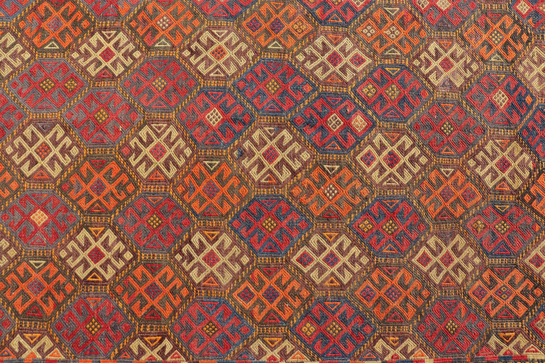 Vintage Turkish Gallery Kilim with all-over Geometric design in Sunset Tone. 
Vintage Gallery Runner Embroidered Kilim Runner, Keivan Woven Arts / rug EN-P13427, country of origin / type: Turkey / Kilim, circa Mid-20th Century.

Measures: 5'1 x